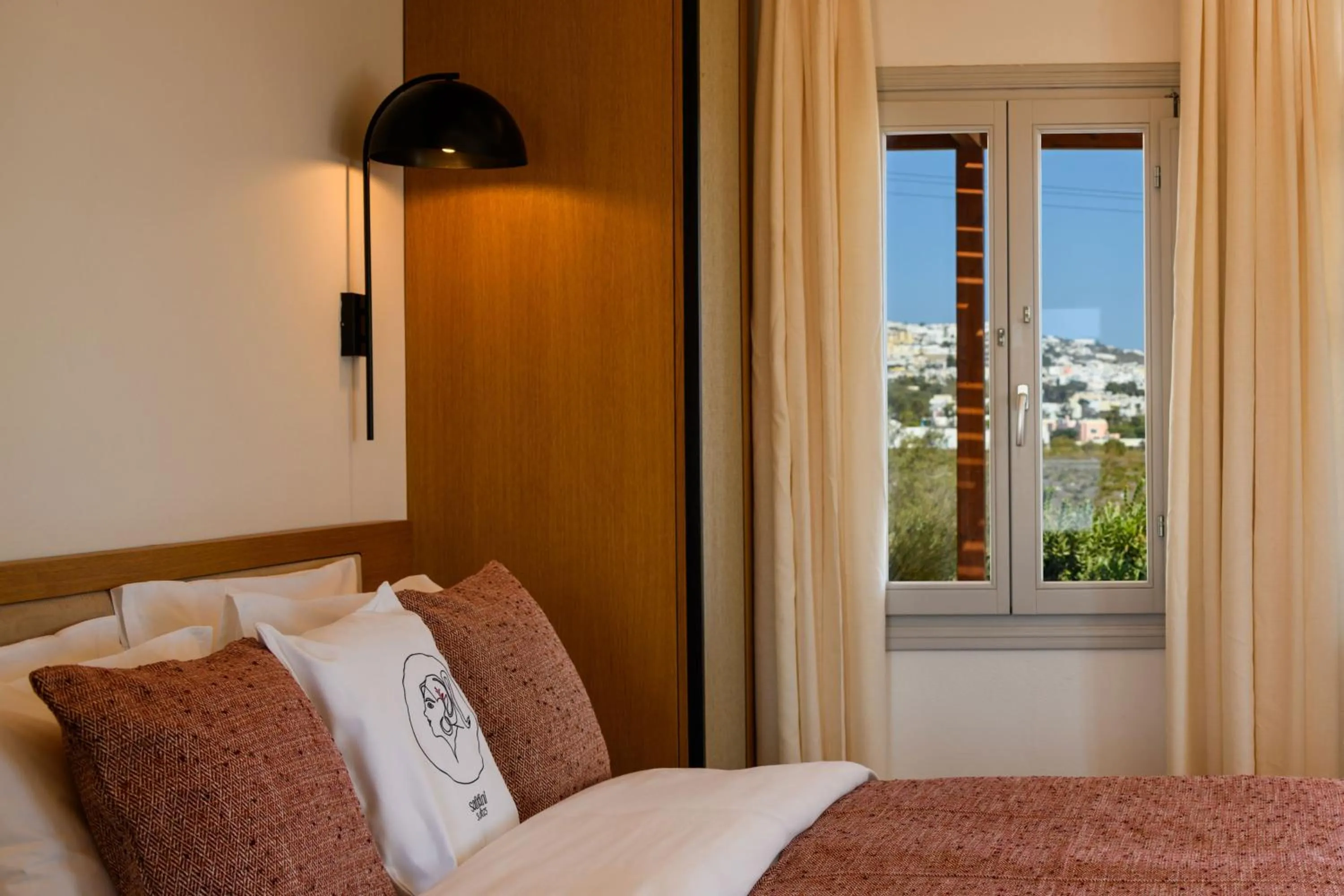 Bed in Safrani Suites