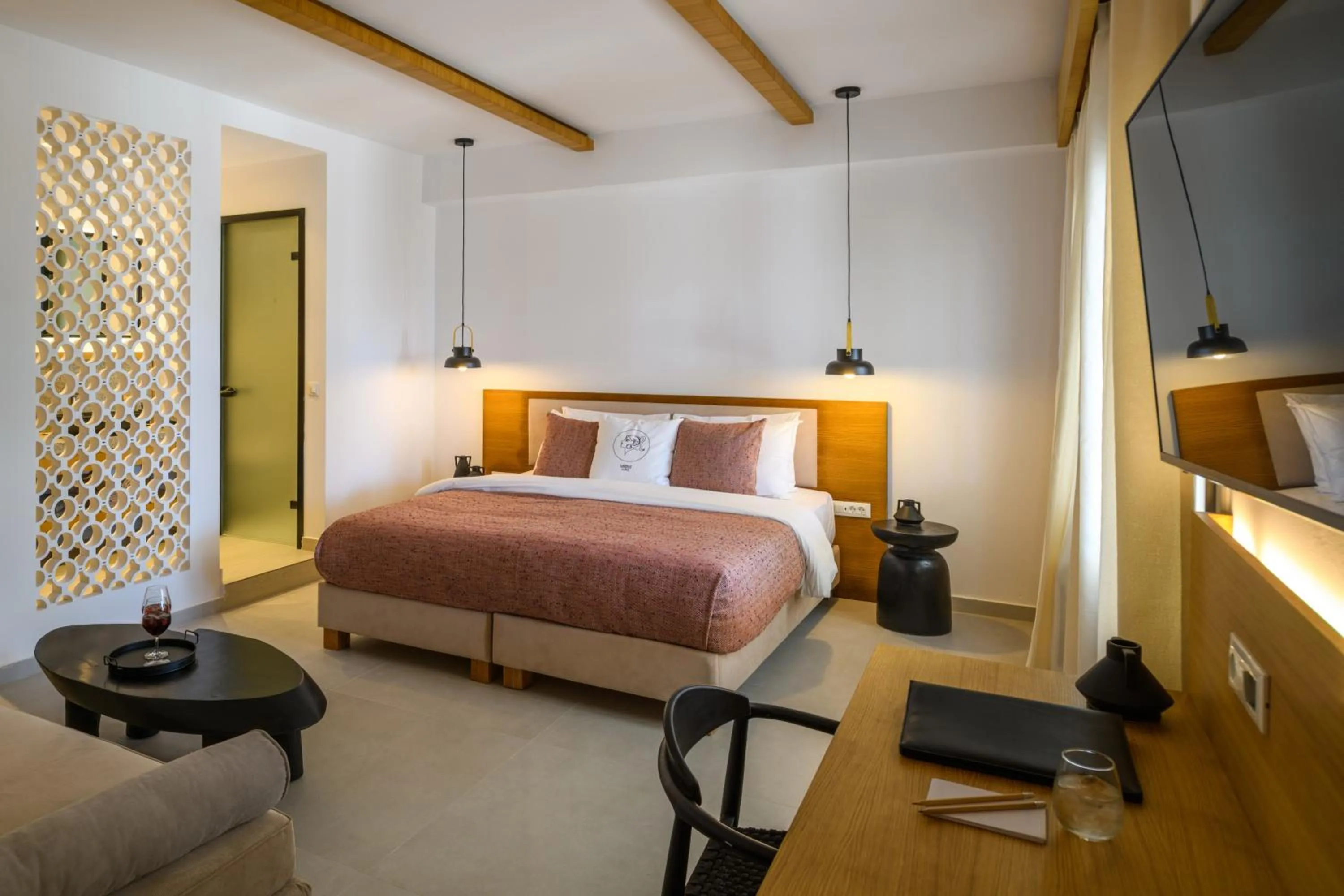 Bed in Safrani Suites