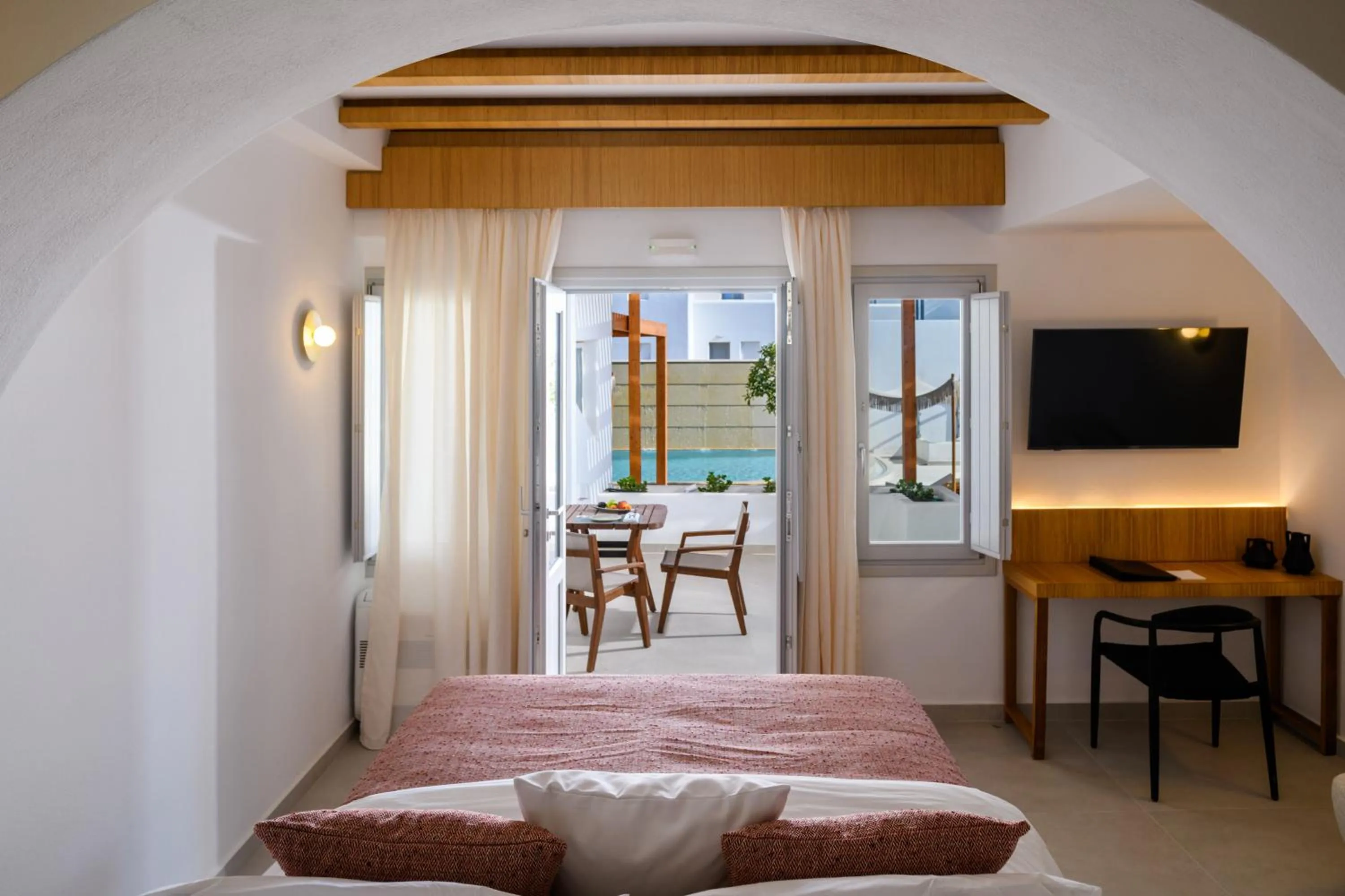 Bed in Safrani Suites