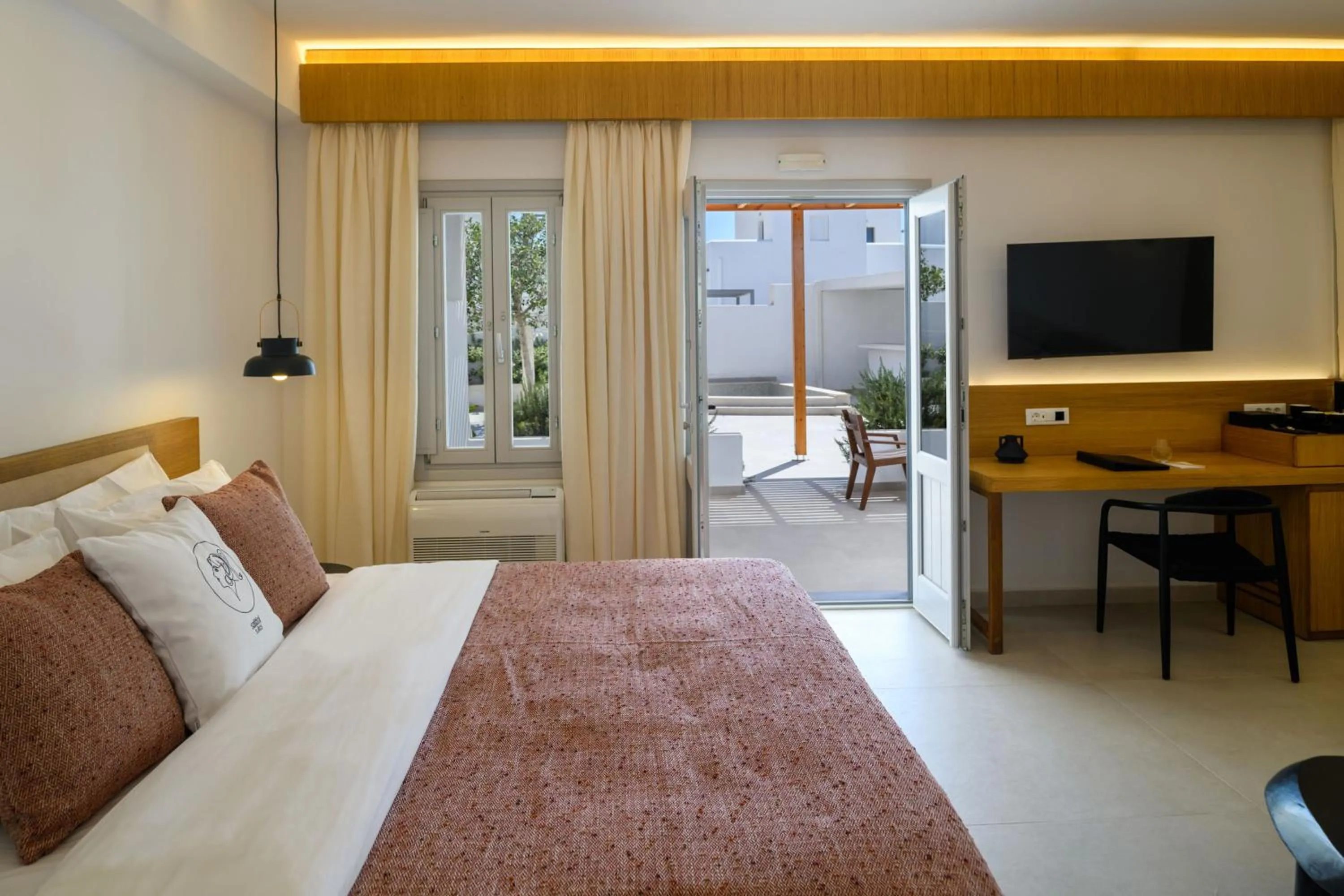 Bed in Safrani Suites