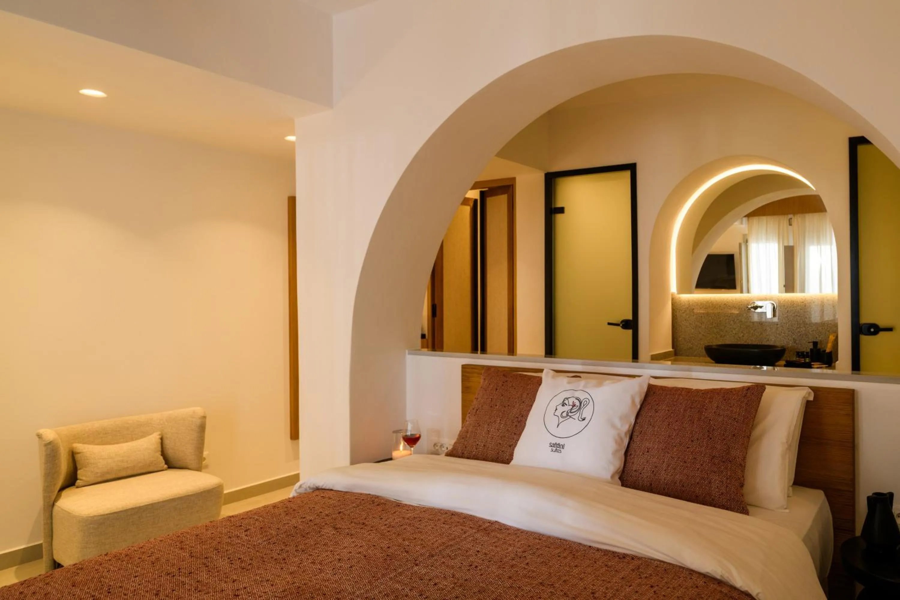 Bed in Safrani Suites