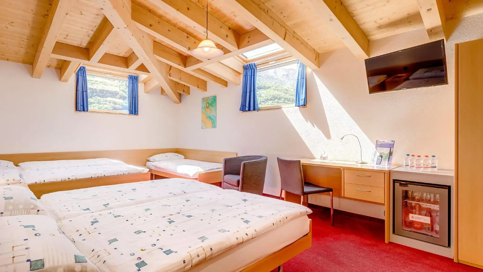 Attic Family Room in Hotel La Perla Attic Family Room in Hotel La Perla