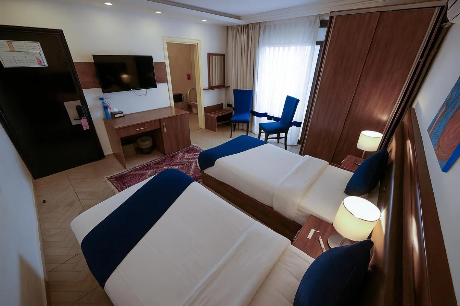 Bed in Corner View Hotel