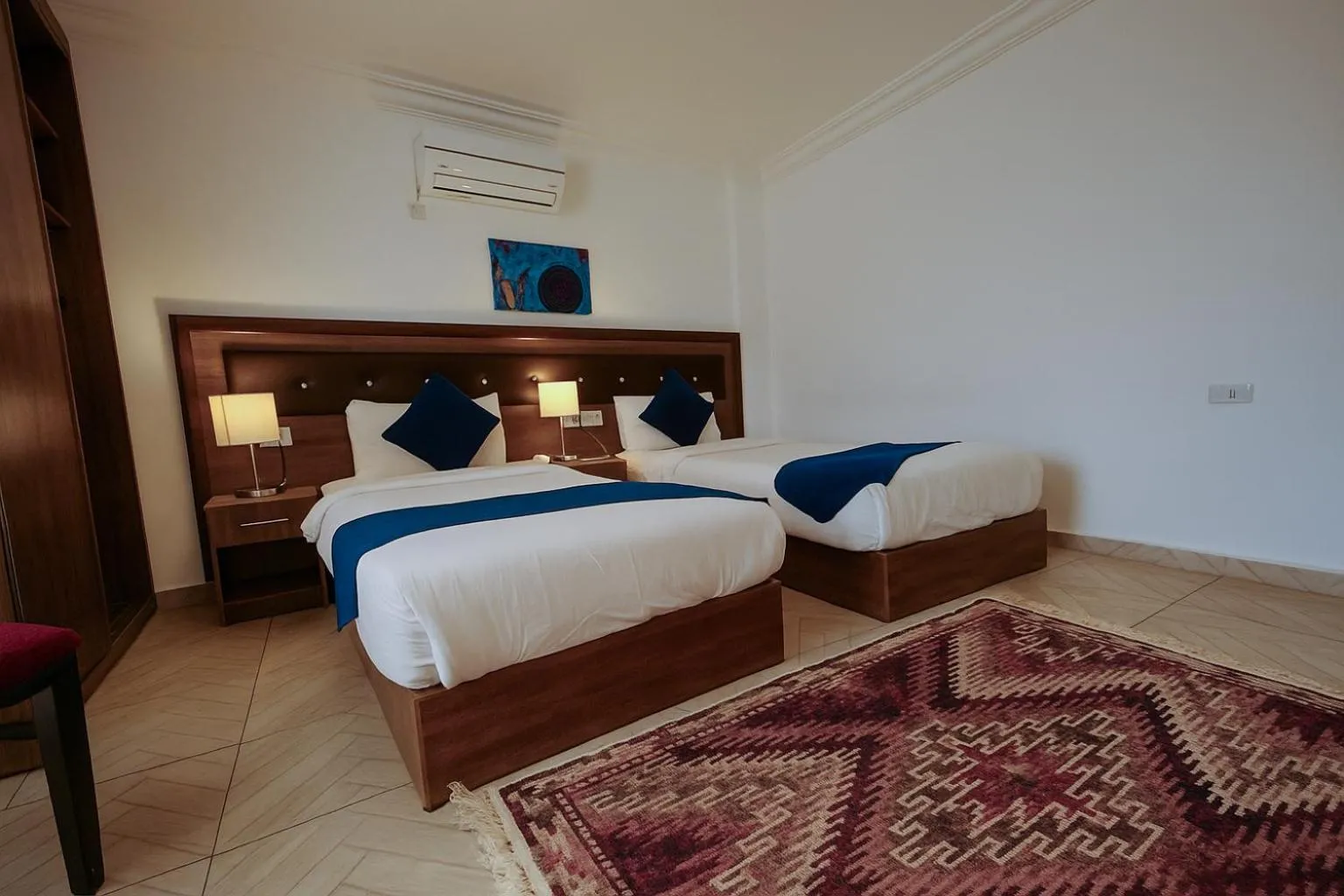 Bed in Corner View Hotel