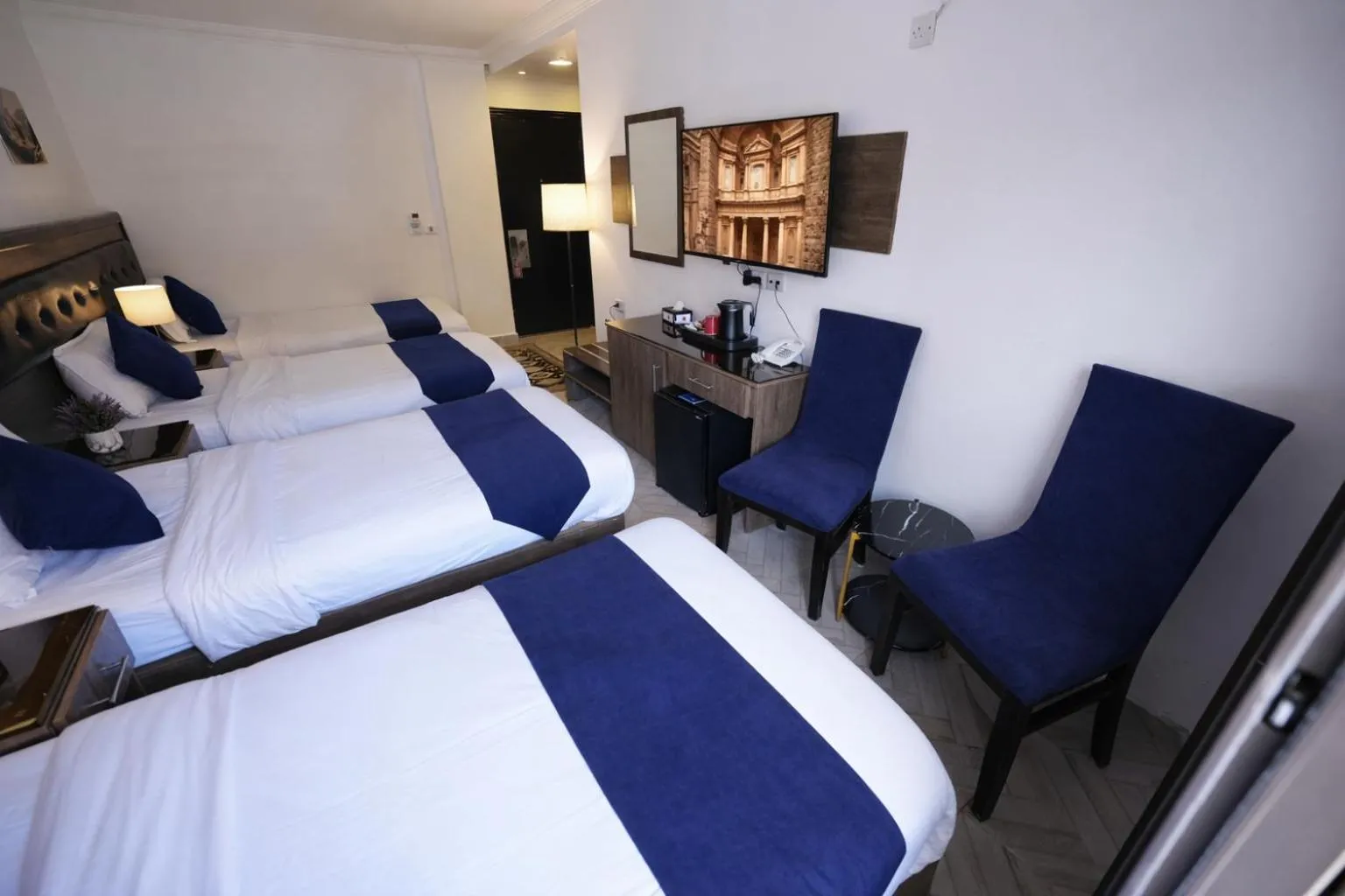 Bed in Corner View Hotel