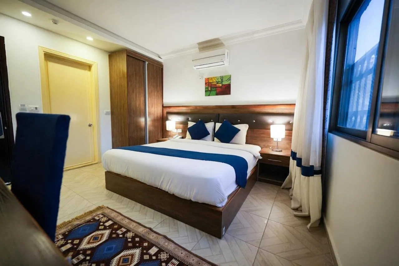 Bed in Corner View Hotel