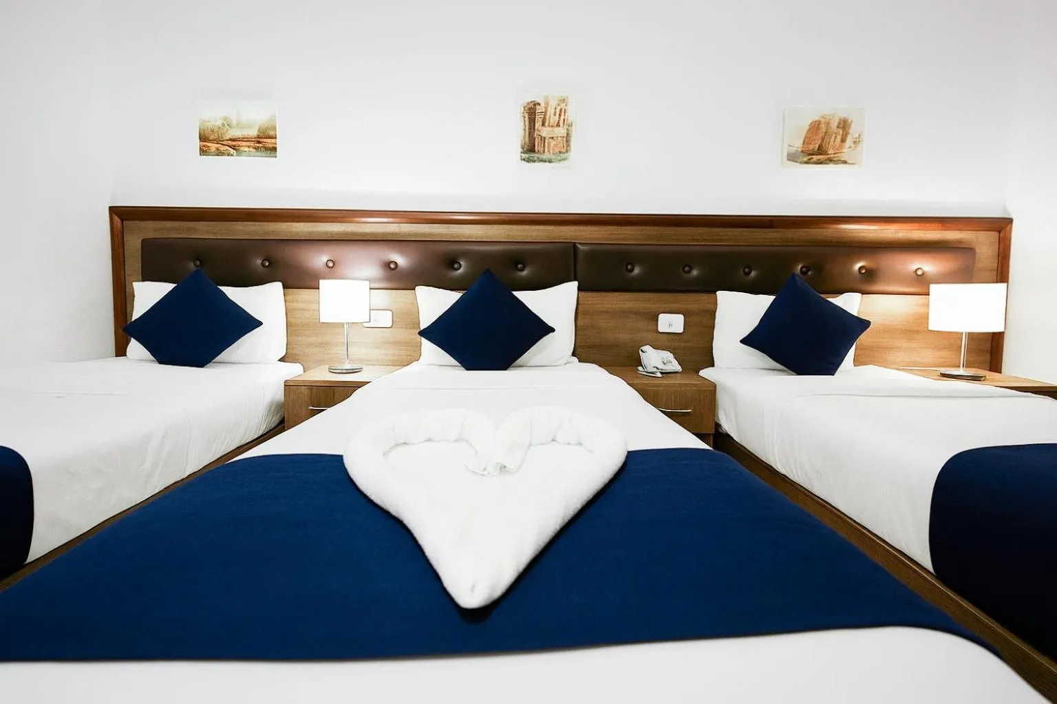 Bed in Corner View Hotel