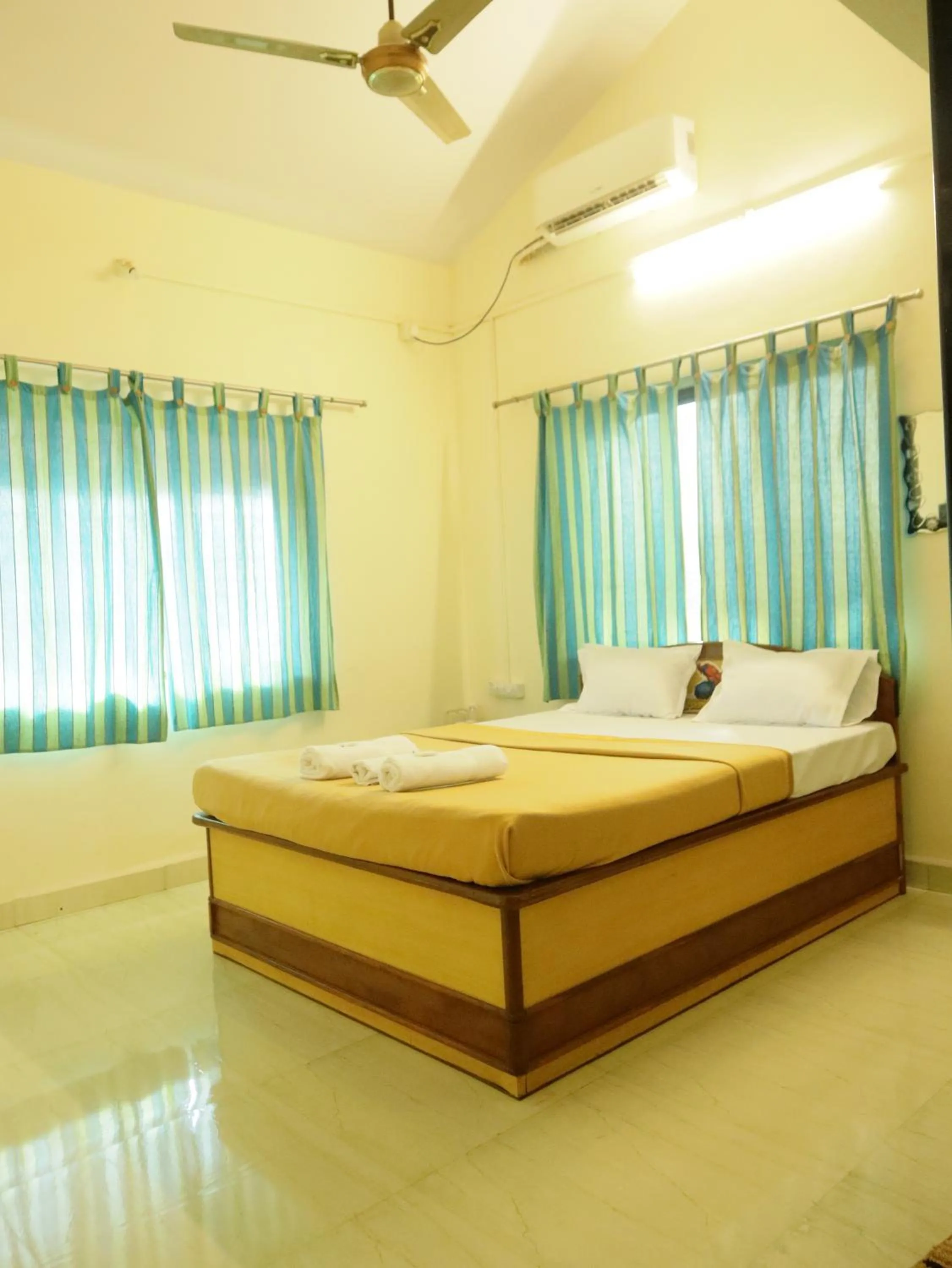 Bed in Hotel sabera residency