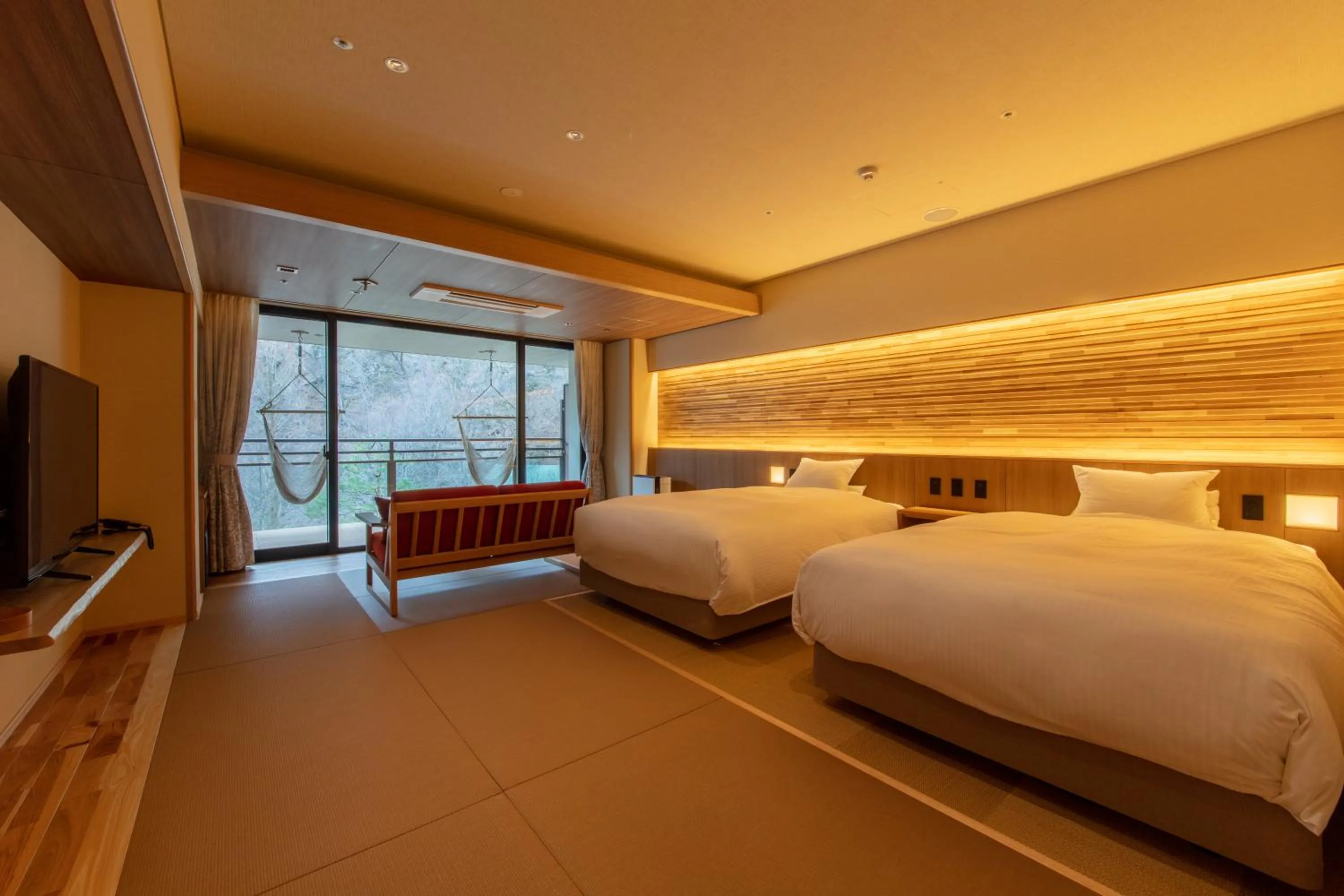 Bed in Sakunami Onsen Yuzukushi Salon Ichinobo