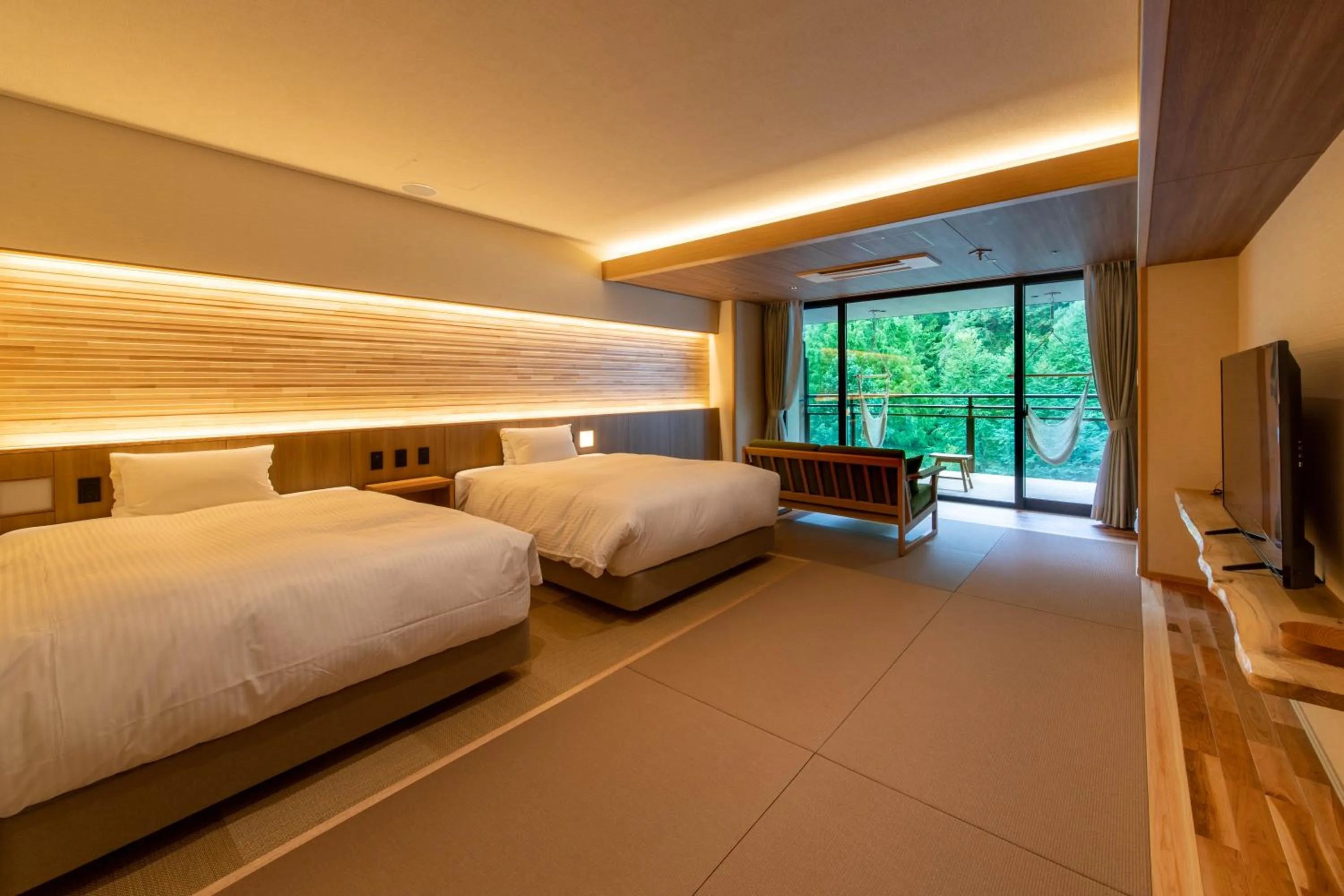 Bed in Sakunami Onsen Yuzukushi Salon Ichinobo