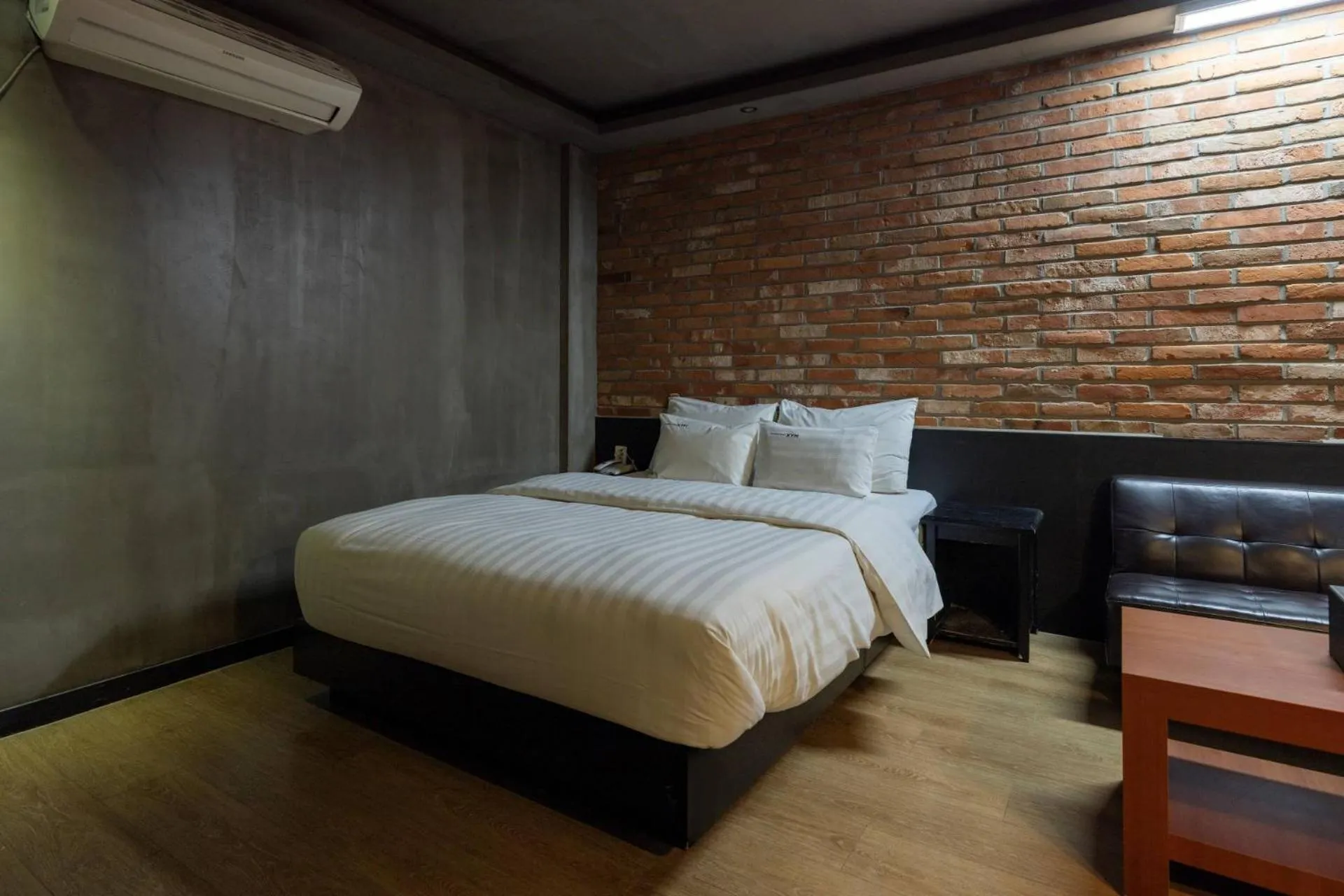 Bed in XYM Hotel Icheon