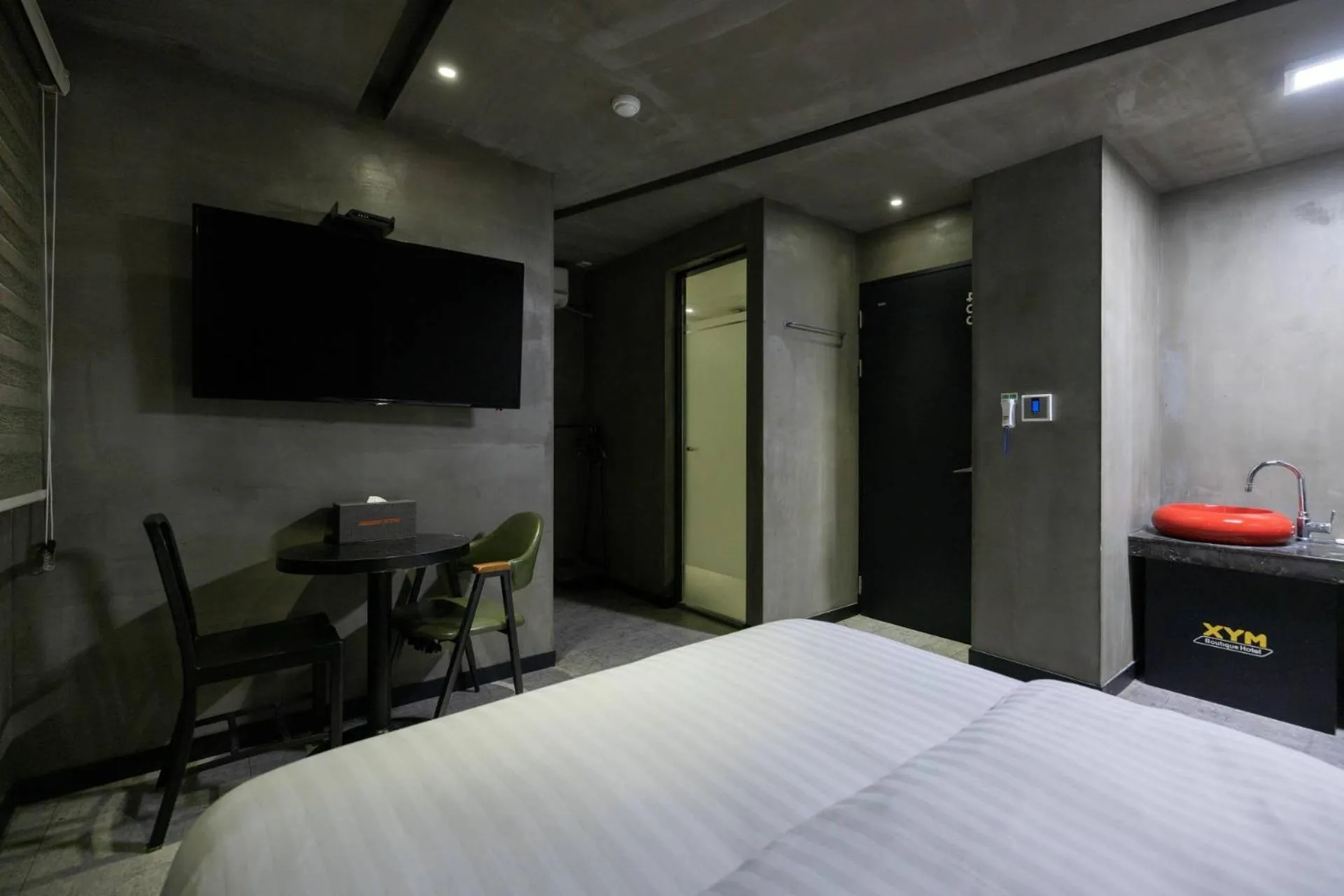 Bed in XYM Hotel Icheon