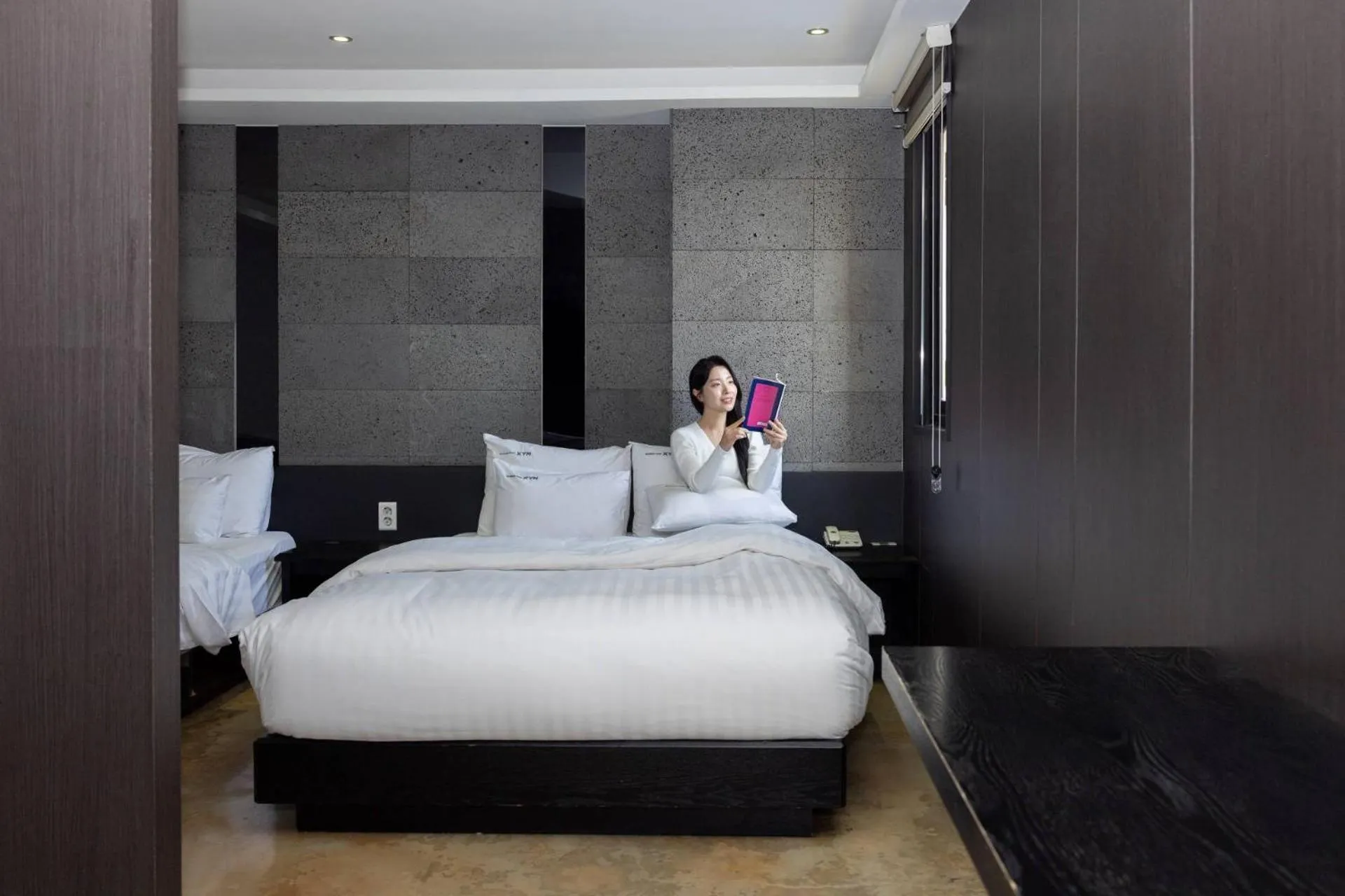 Bed in XYM Hotel Icheon