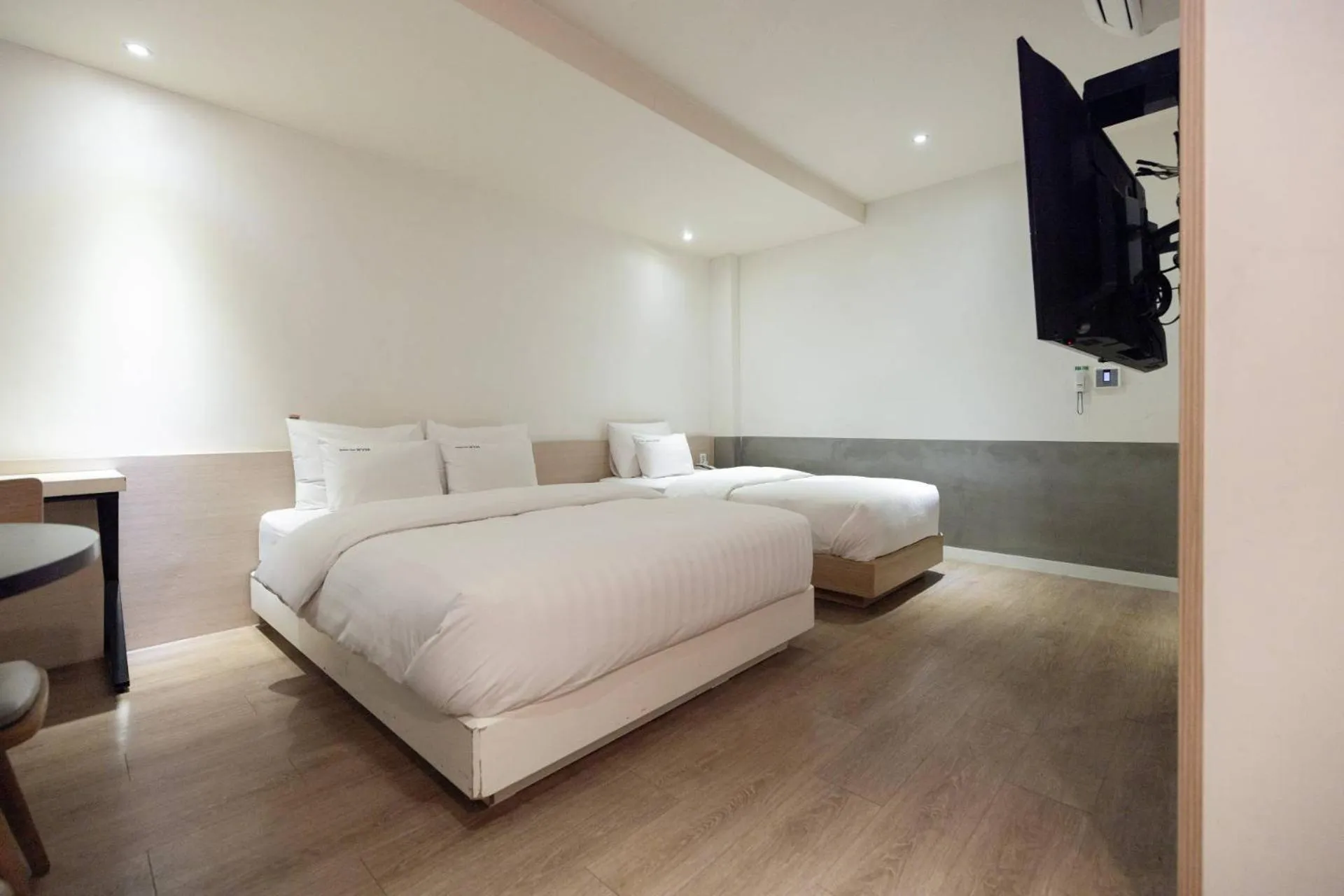 Bed in XYM Hotel Icheon