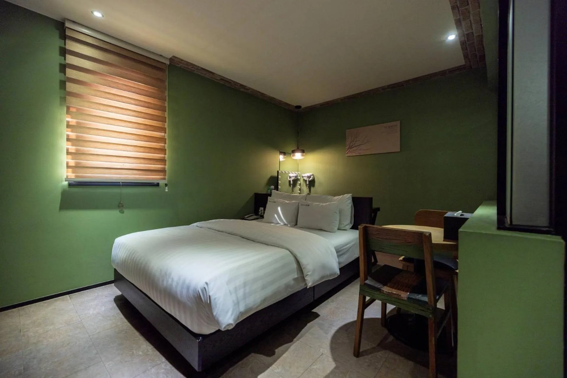 Bed in XYM Hotel Icheon