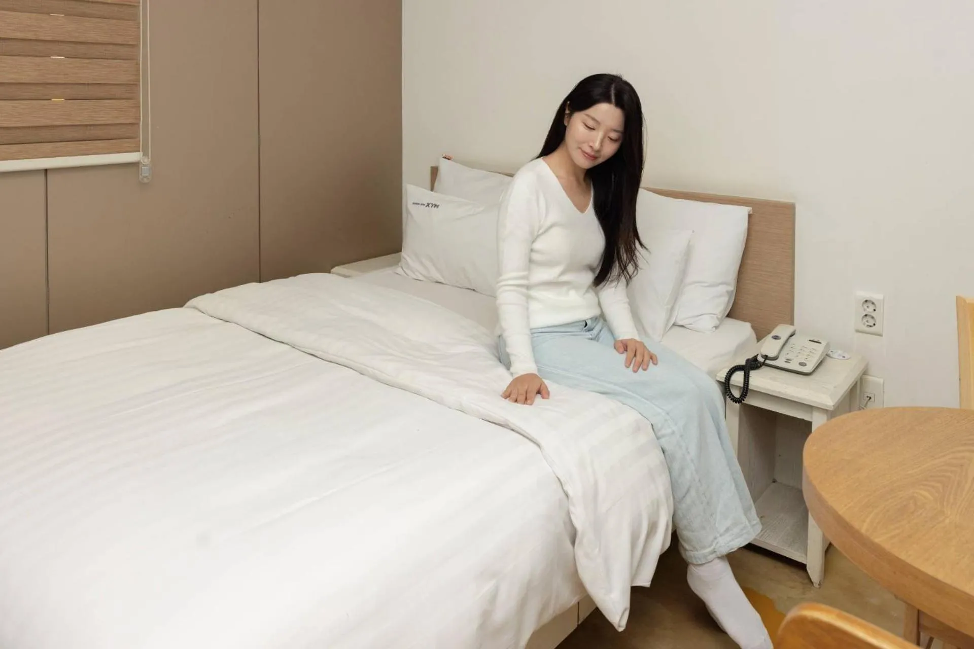 Bed in XYM Hotel Icheon