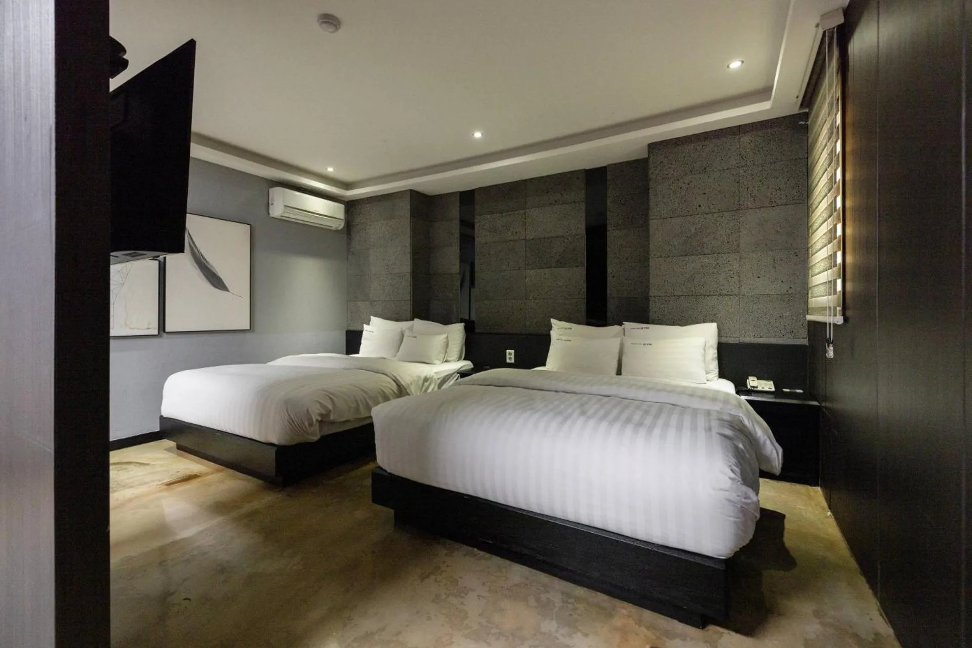 Bed in XYM Hotel Icheon