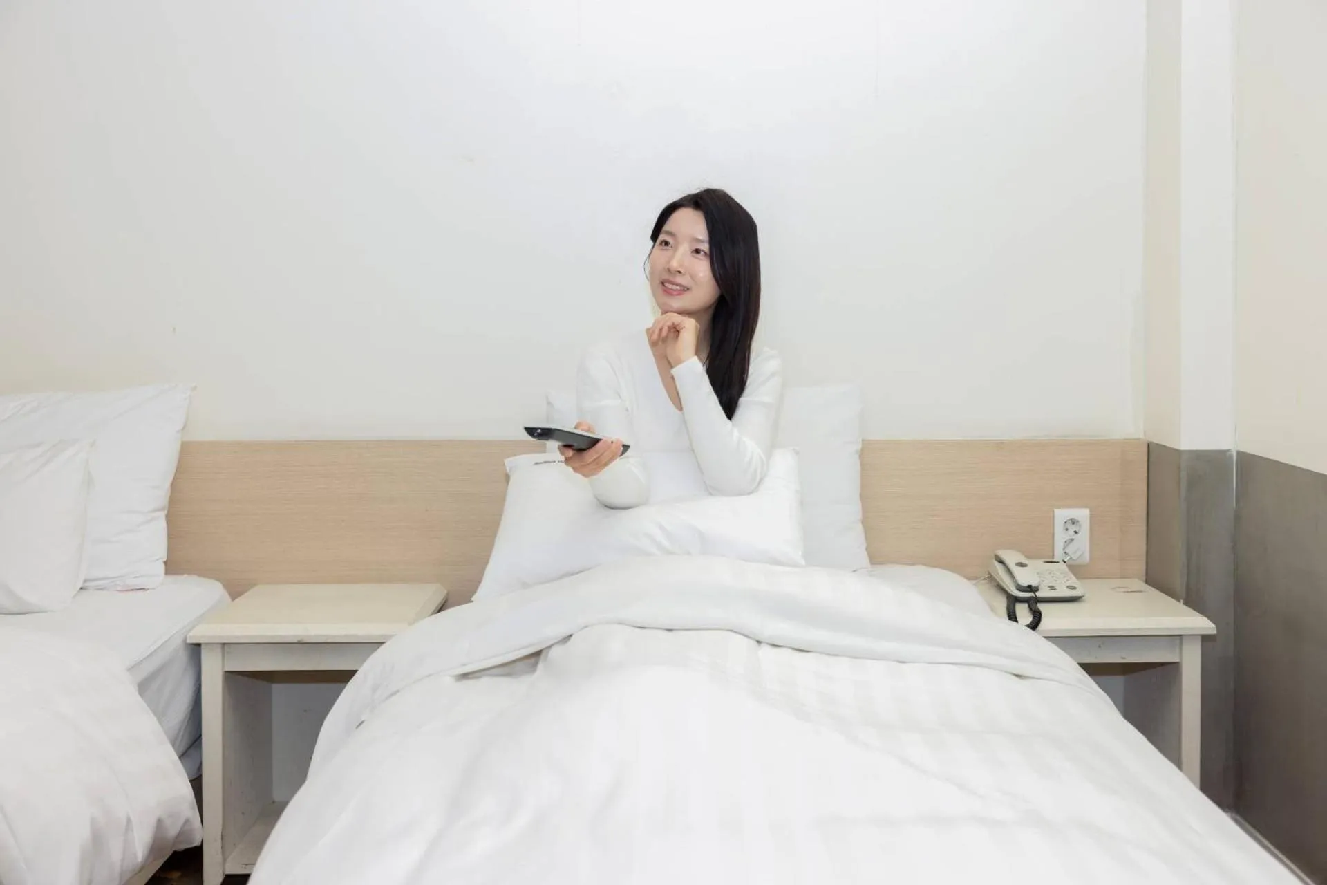 Bed in XYM Hotel Icheon