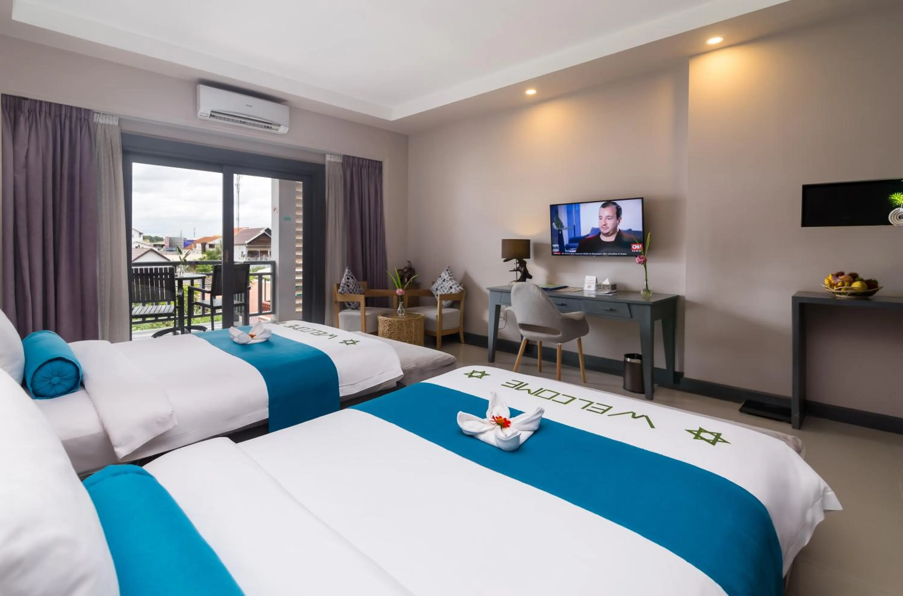 Photo of the whole room, Bed in Damrei Angkor Hotel