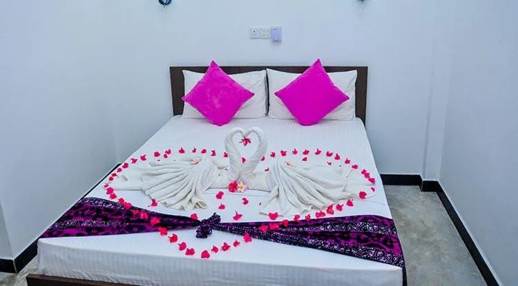 Bed in Sea Breeze Hotel