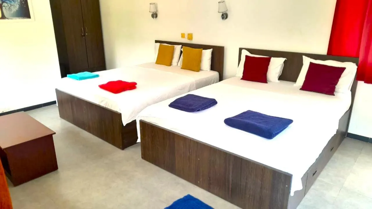 Bed in Sea Breeze Hotel