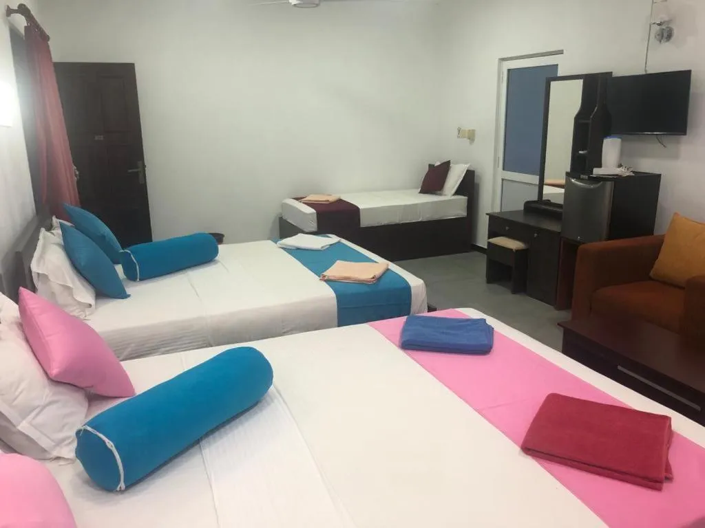 Bed in Sea Breeze Hotel