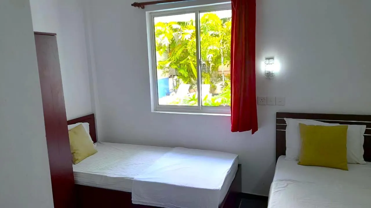 Bed in Sea Breeze Hotel