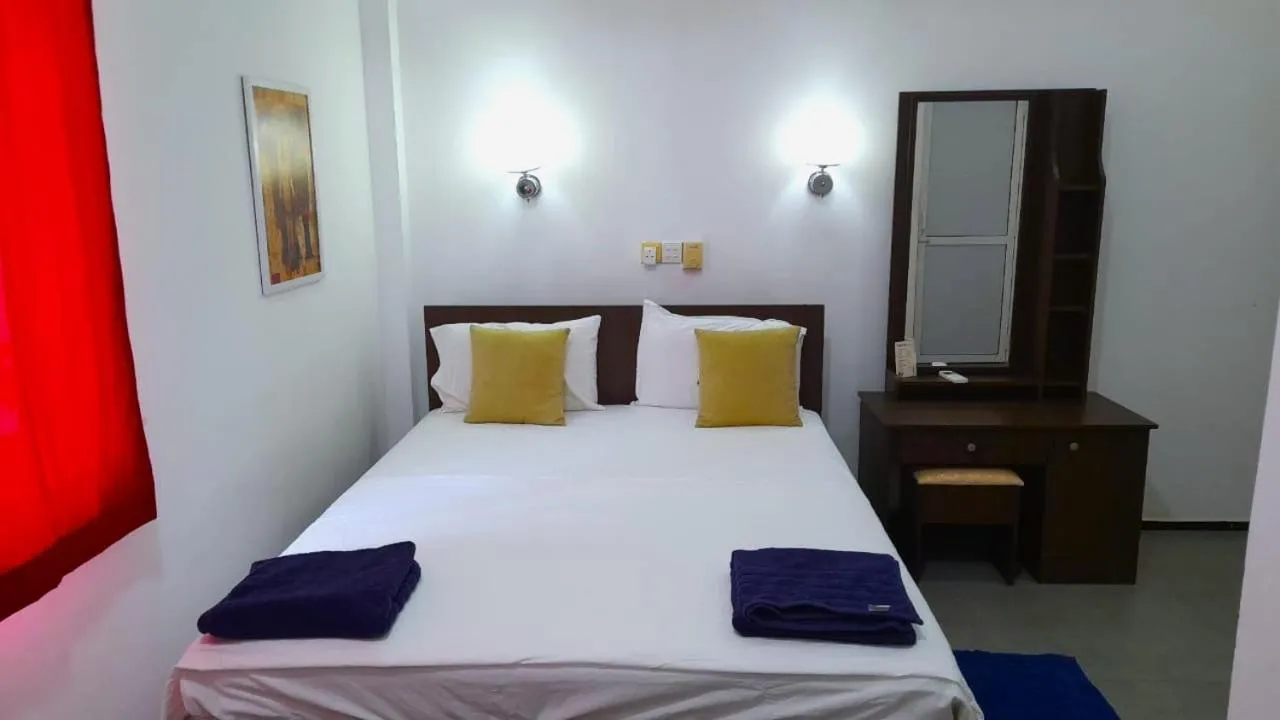 Bed in Sea Breeze Hotel
