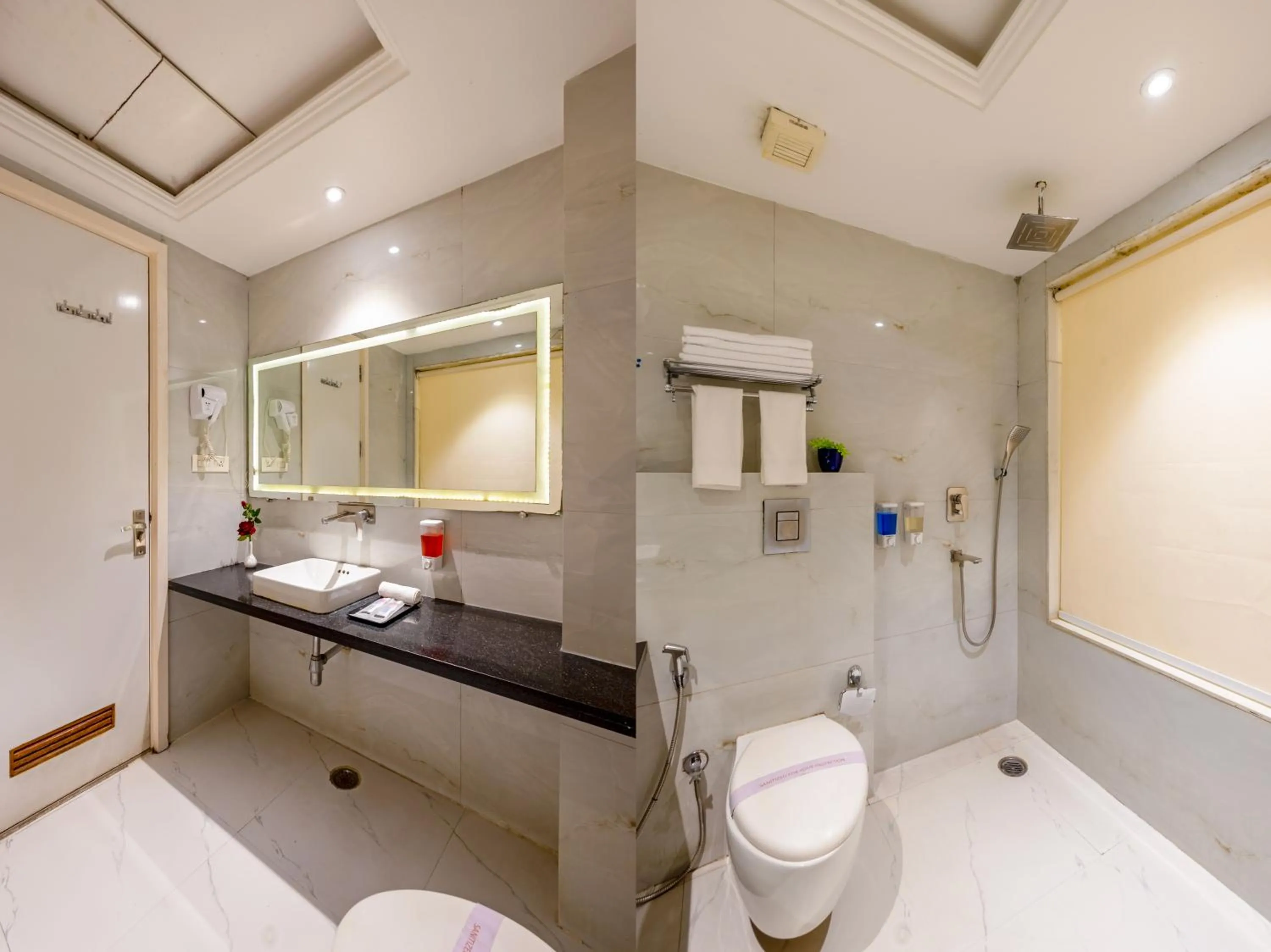 Shower in Aman Continental With Restaurant - 5Mins from Connaught Place ,Railway Station & Metro