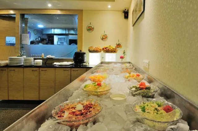 Food and drinks in Aman Continental With Restaurant - 5Mins from Connaught Place ,Railway Station & Metro