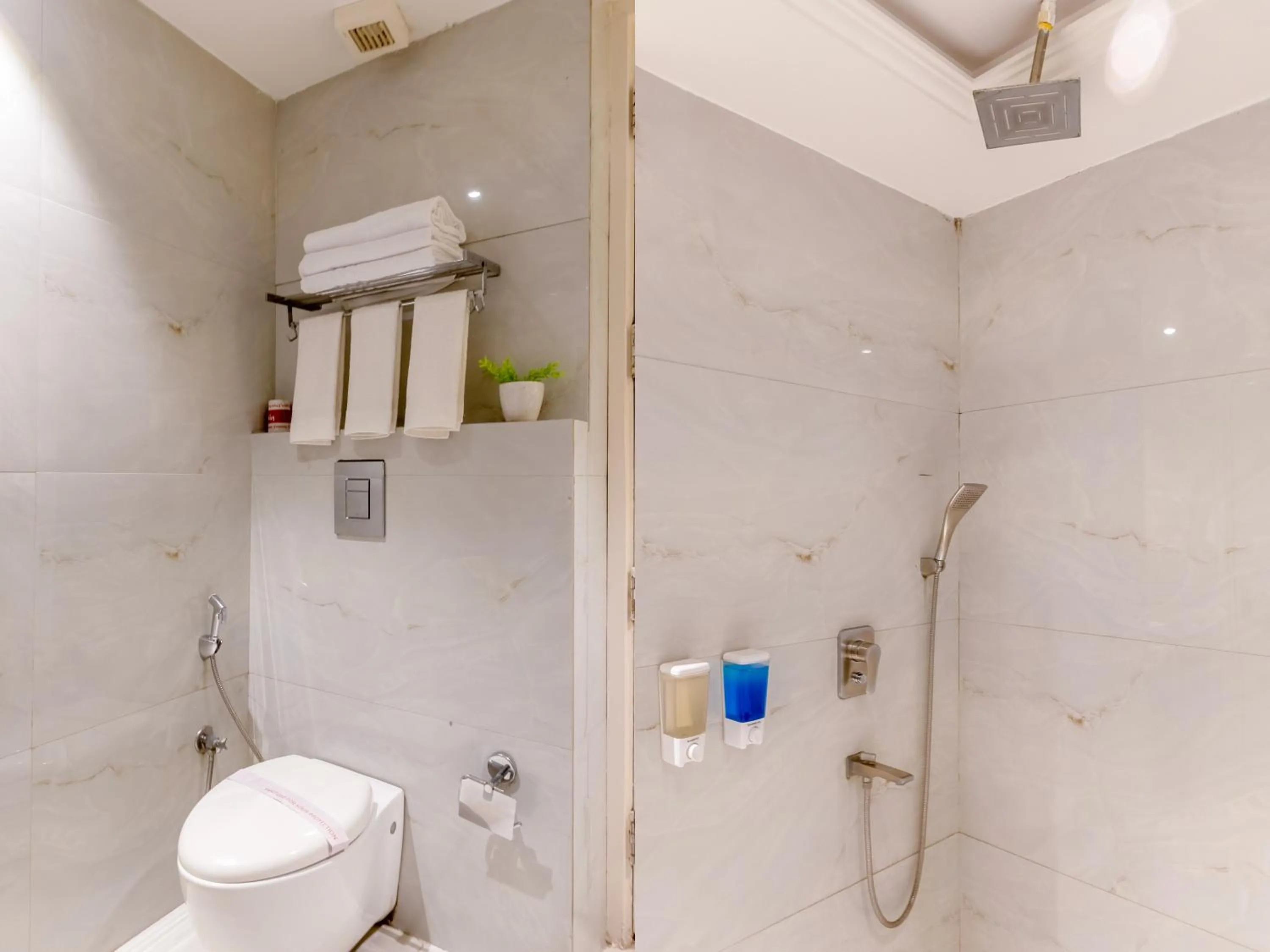 Toilet in Aman Continental With Restaurant - 5Mins from Connaught Place ,Railway Station & Metro