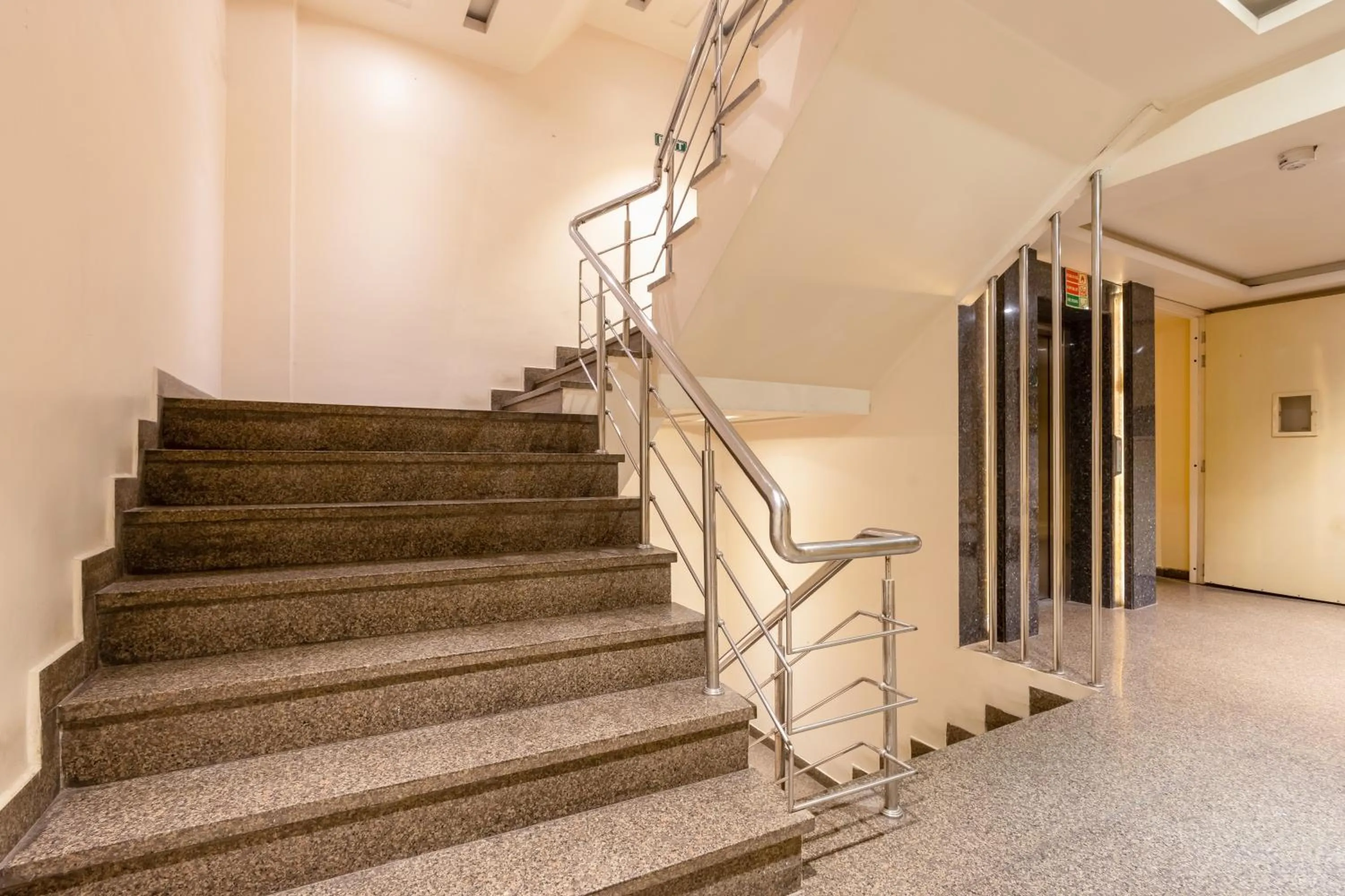 elevator in Aman Continental With Restaurant - 5Mins from Connaught Place ,Railway Station & Metro