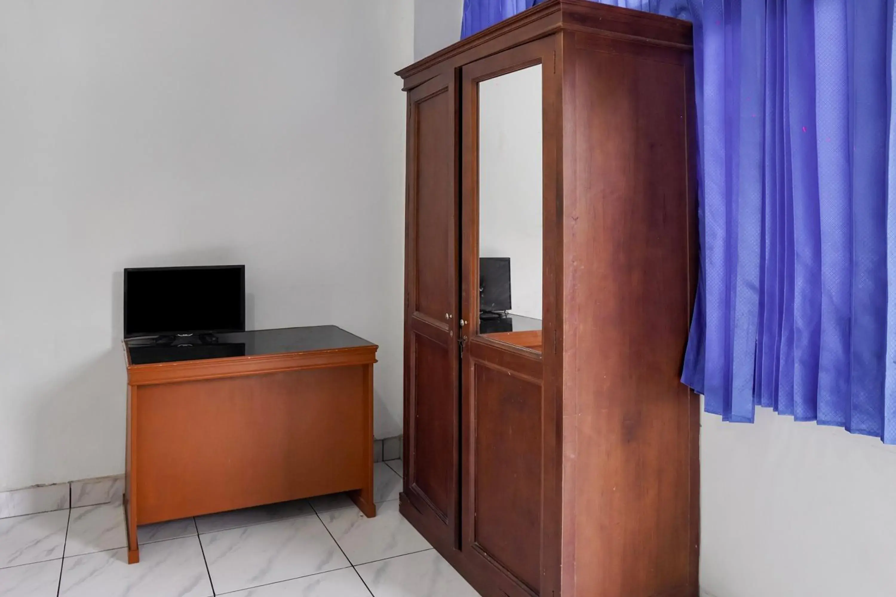 Deluxe Family Room in Collection O near Universitas Negeri Padang formerly Hotel Amra Deluxe Family Room in Collection O near Universitas Negeri Padang formerly Hotel Amra