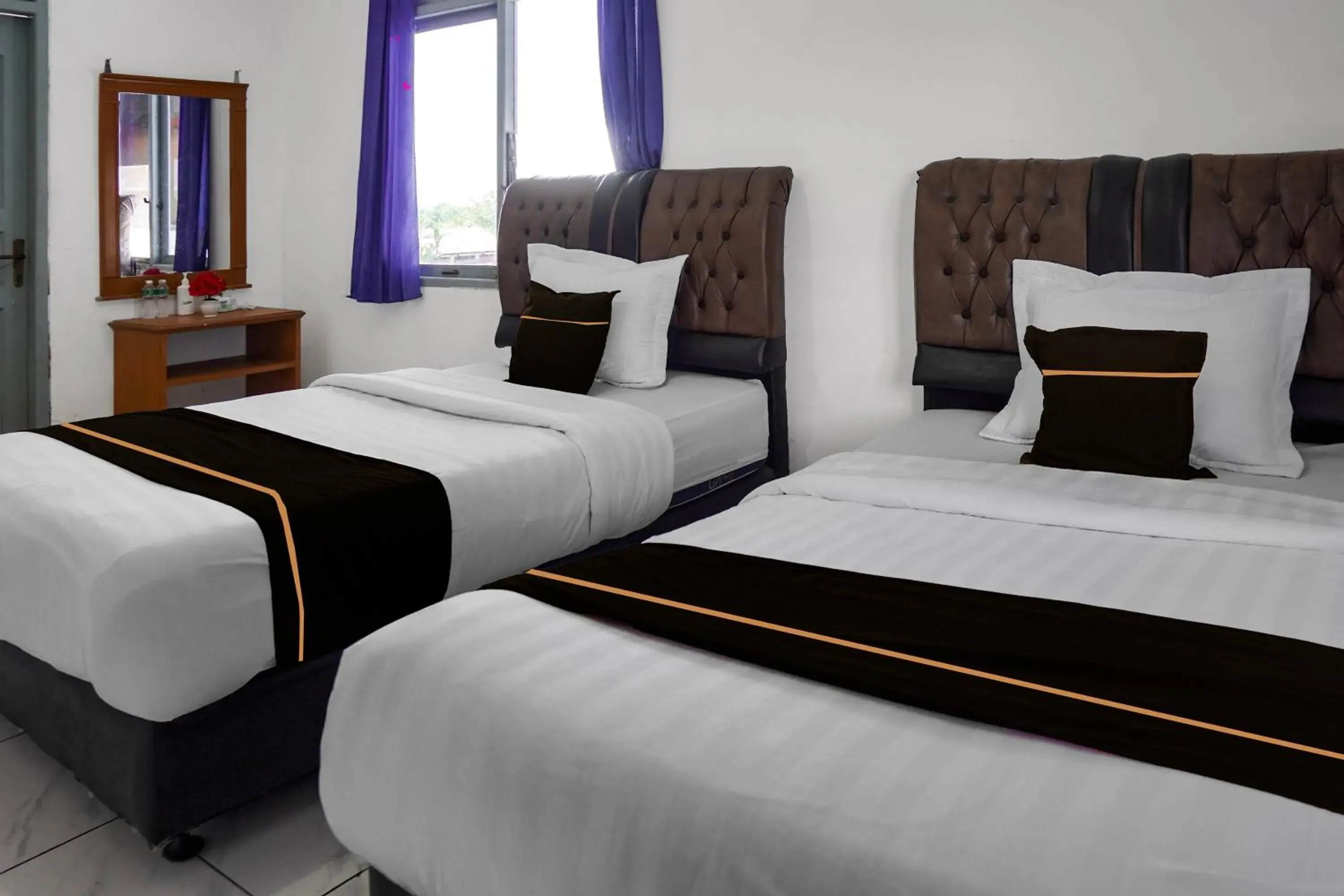 Standard Twin Room in Collection O near Universitas Negeri Padang formerly Hotel Amra Standard Twin Room in Collection O near Universitas Negeri Padang formerly Hotel Amra