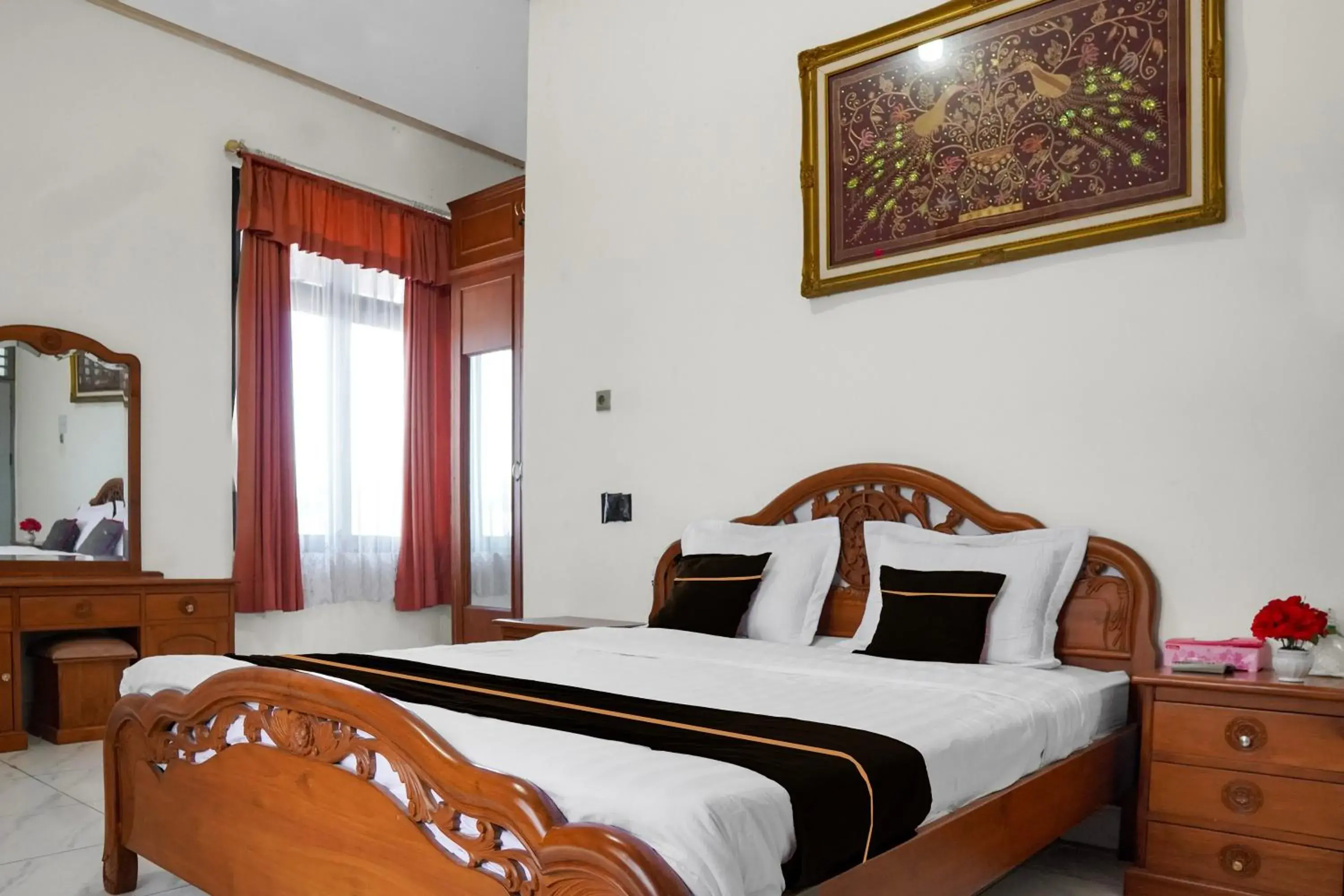 Deluxe Double Room in Collection O near Universitas Negeri Padang formerly Hotel Amra Deluxe Double Room in Collection O near Universitas Negeri Padang formerly Hotel Amra