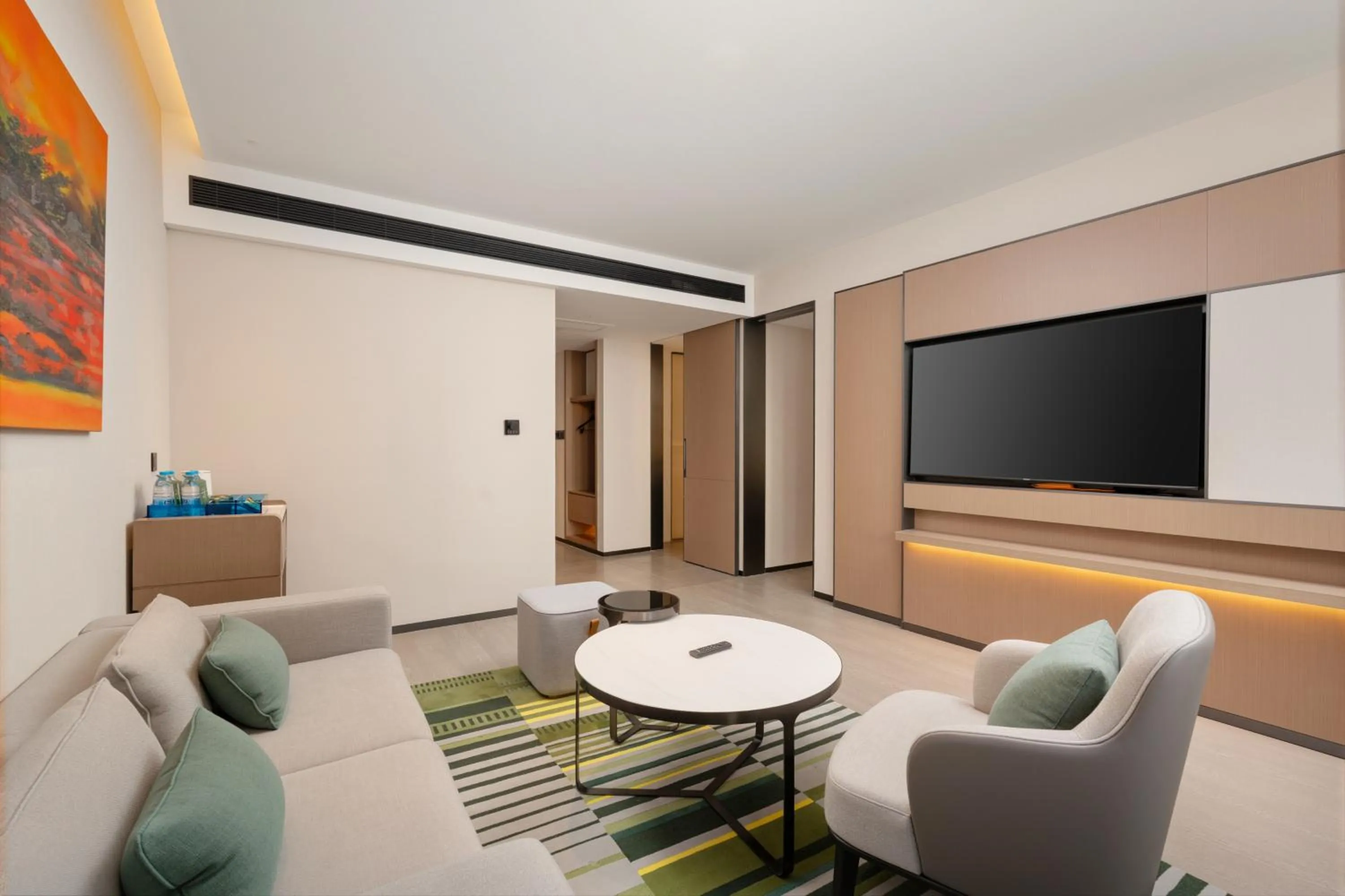 Living room in Holiday Inn Beijing Daxing Movie Park by IHG