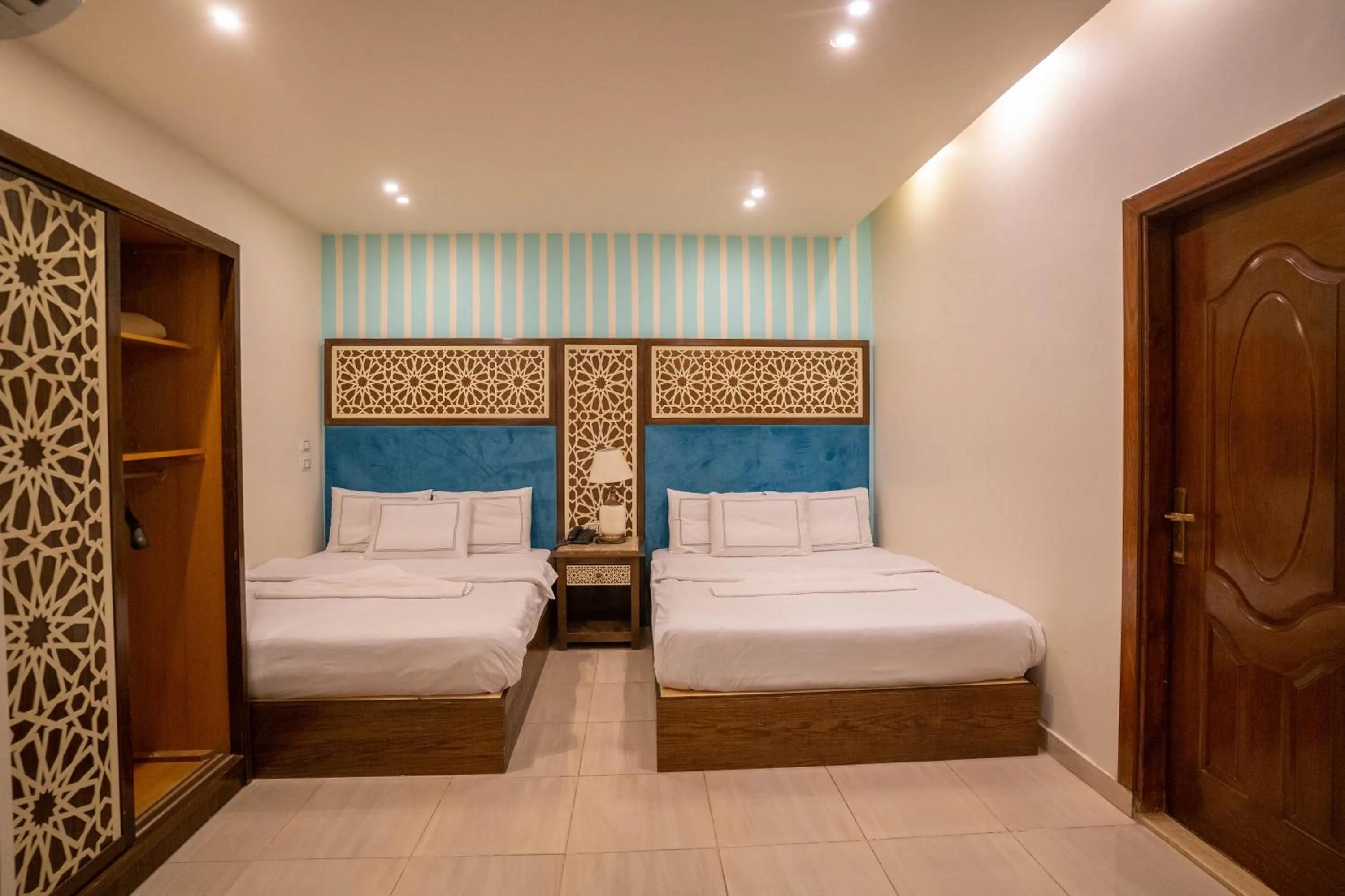 Bed in Great Pyramid Inn