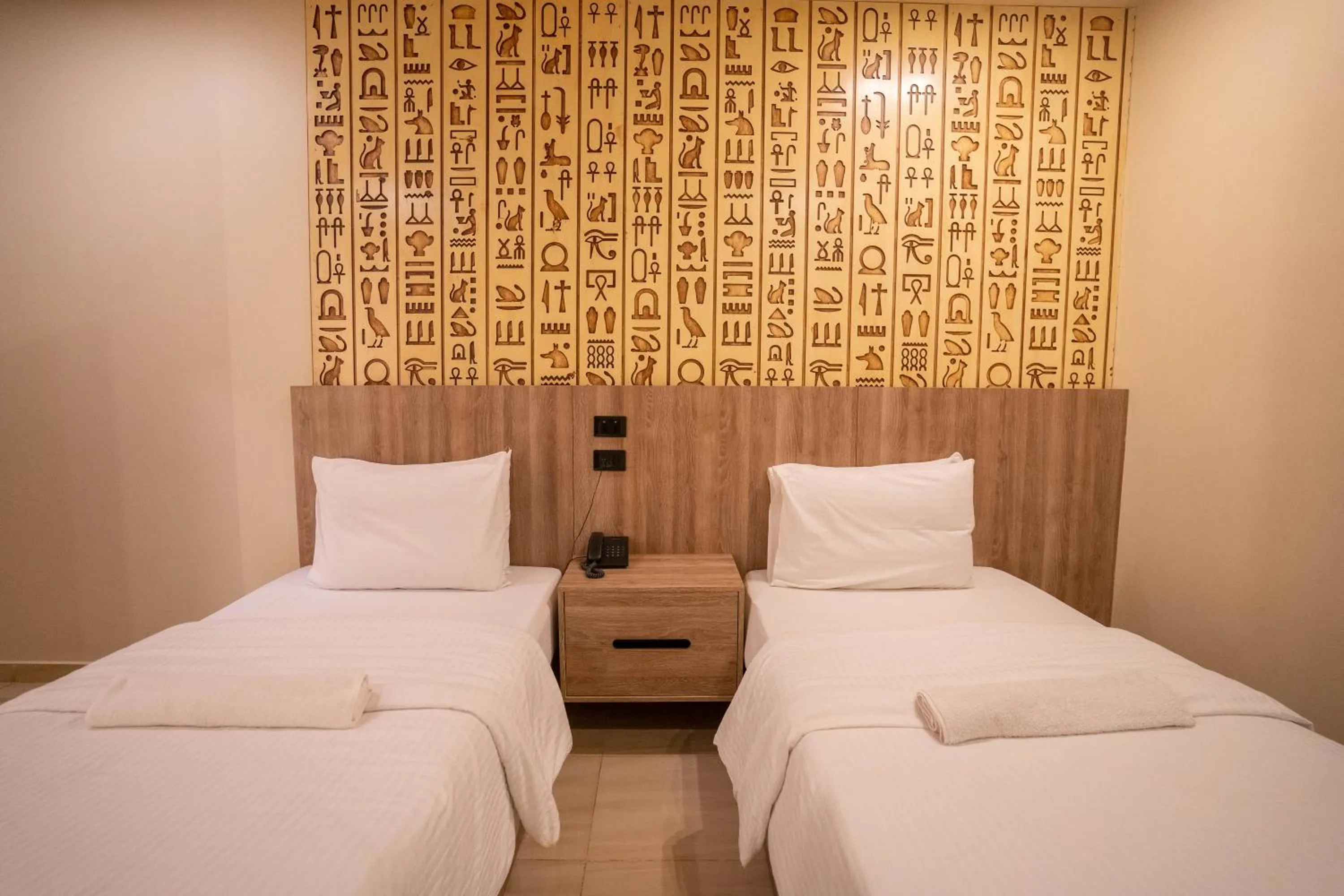 Bed in Great Pyramid Inn