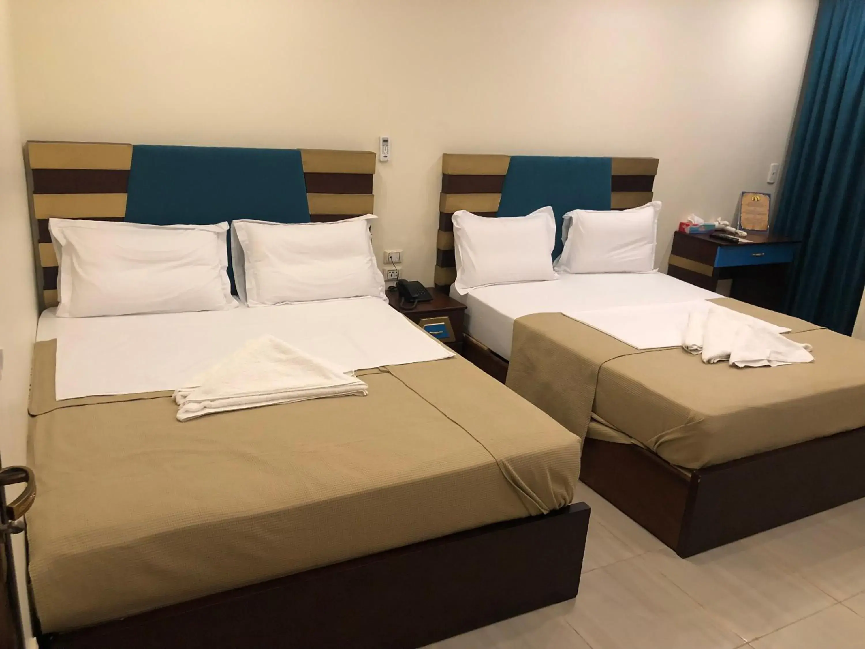 Standard Quadruple Room with window in Great Pyramid Inn Standard Quadruple Room with window in Great Pyramid Inn