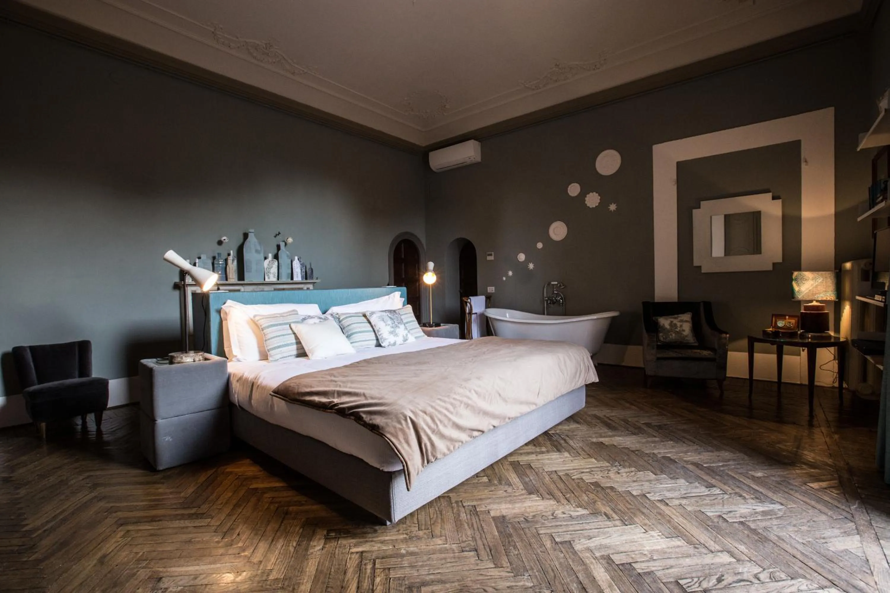 Photo of the whole room, Bed in AdAstra Suites