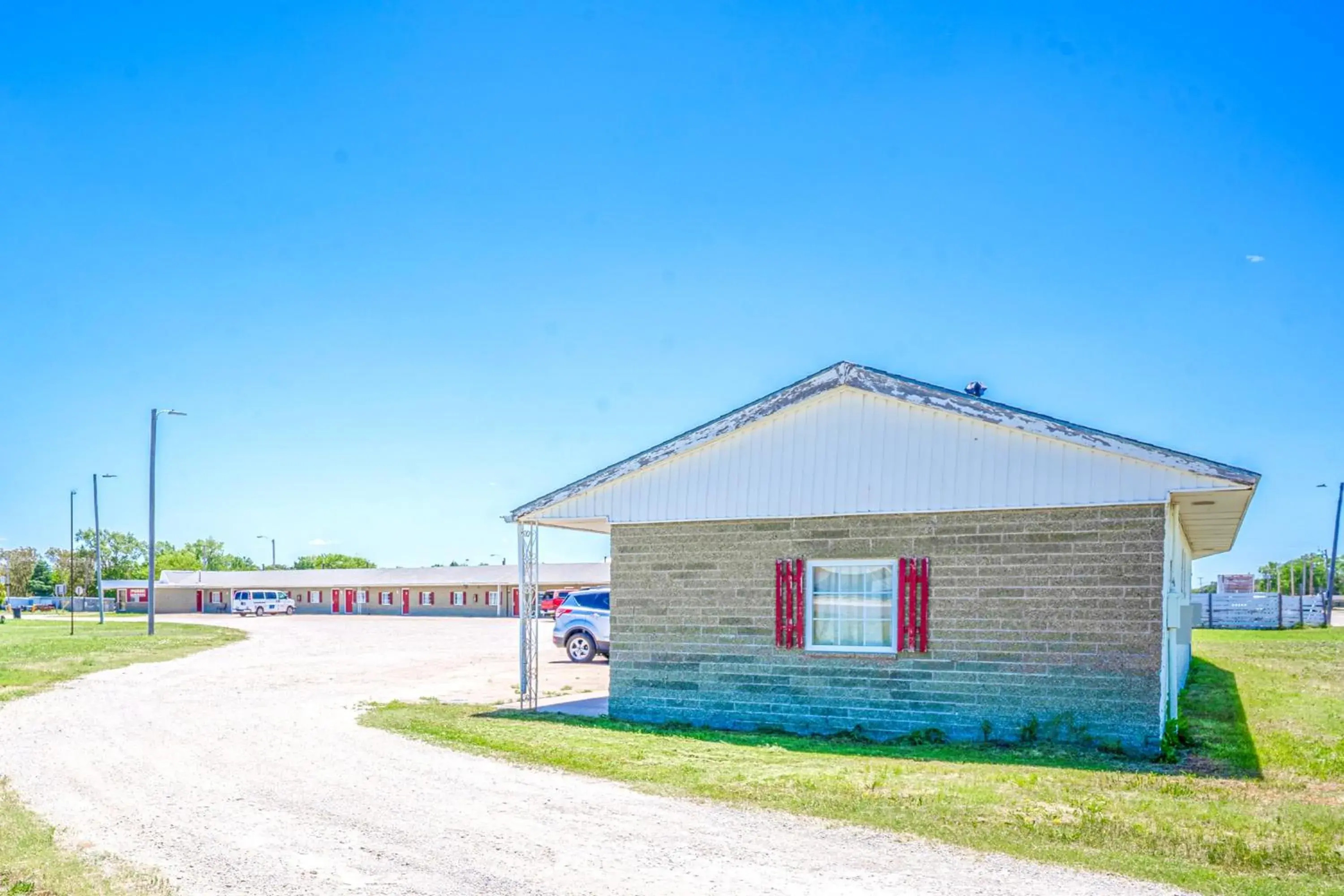 Facade/entrance in Green Acre Motel by OYO Near Rush County Airport Facade/entrance in Green Acre Motel by OYO Near Rush County Airport