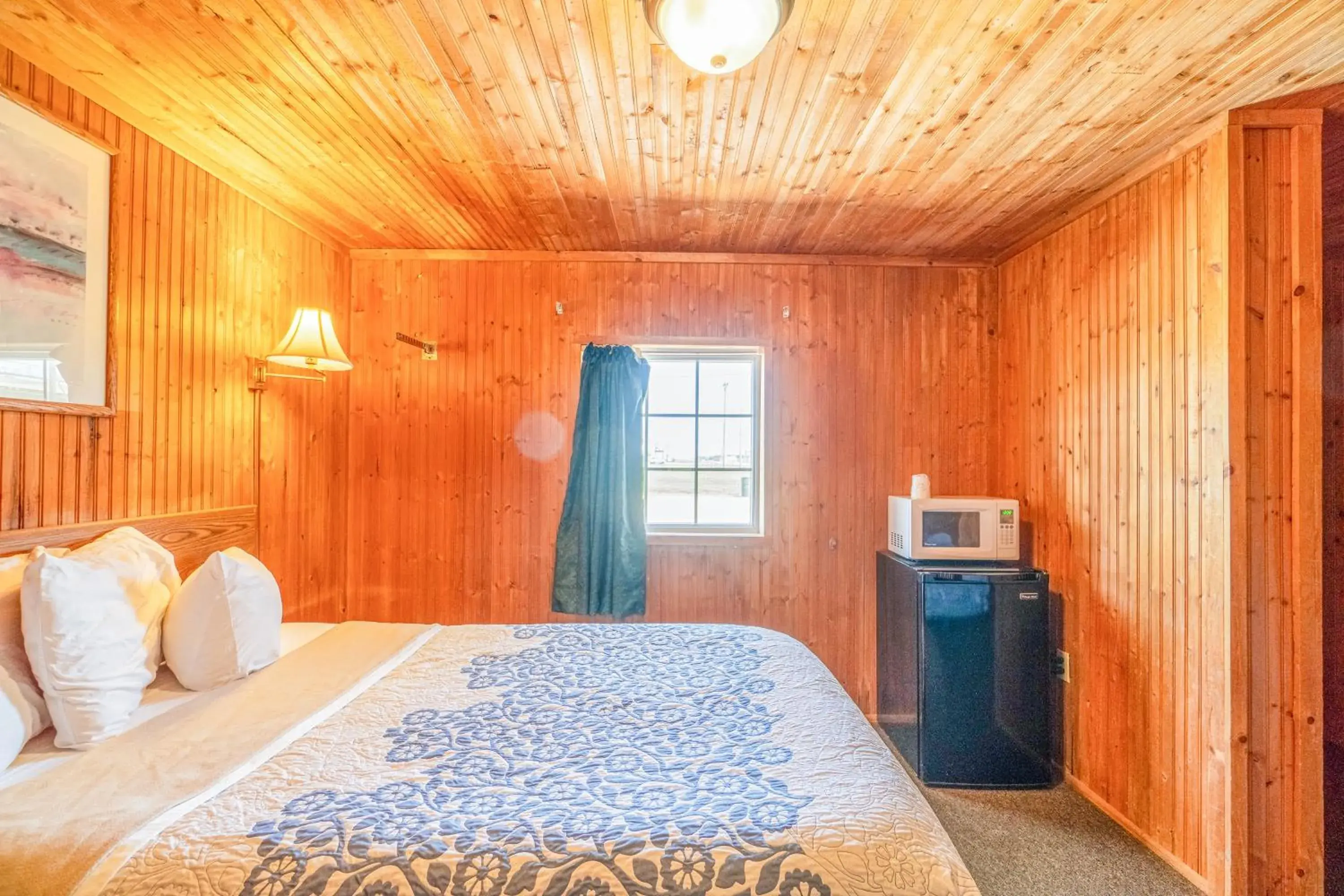 Bedroom, Bed in Green Acre Motel by OYO Near Rush County Airport Bedroom, Bed in Green Acre Motel by OYO Near Rush County Airport