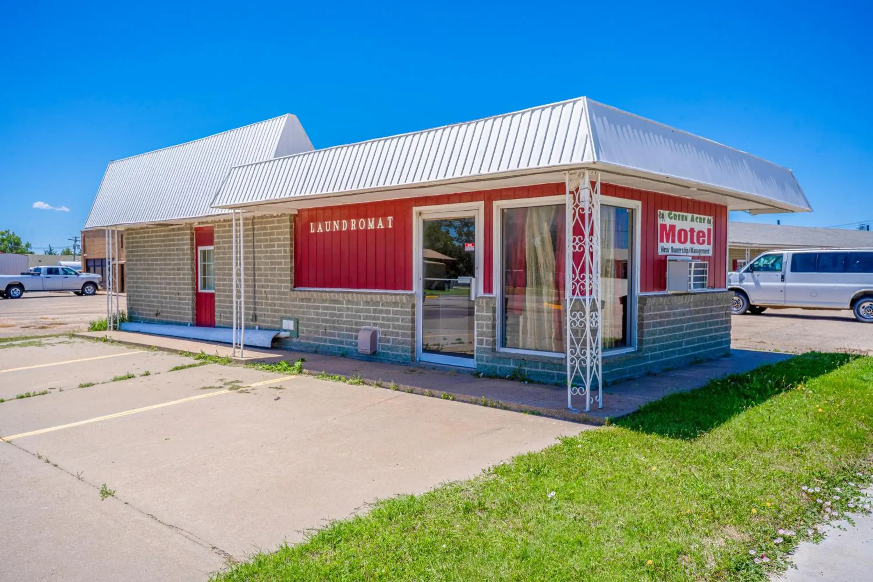 Property building in Green Acre Motel by OYO Near Rush County Airport Property building in Green Acre Motel by OYO Near Rush County Airport