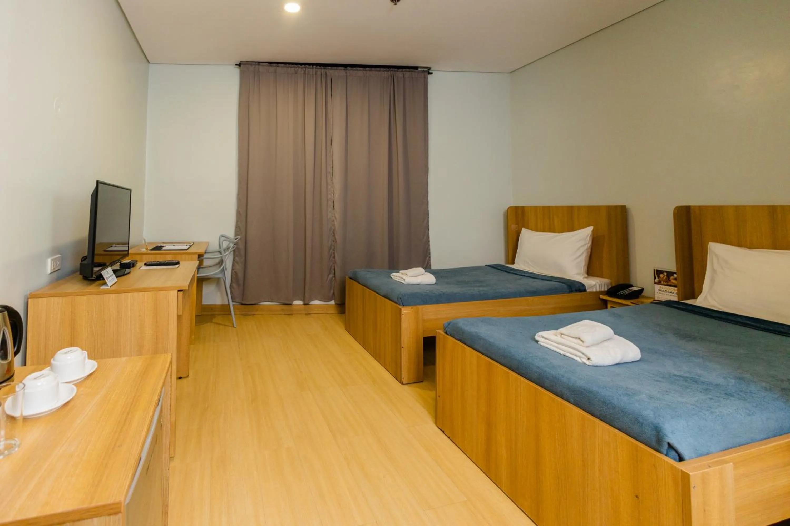 Bed in Madison 101 Hotel + Tower