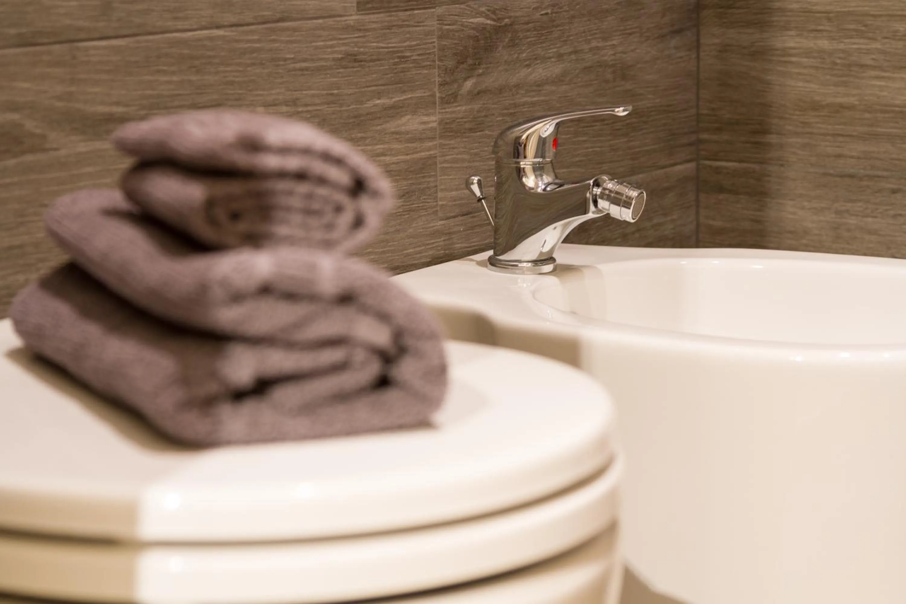 Toilet in Romano Rooms