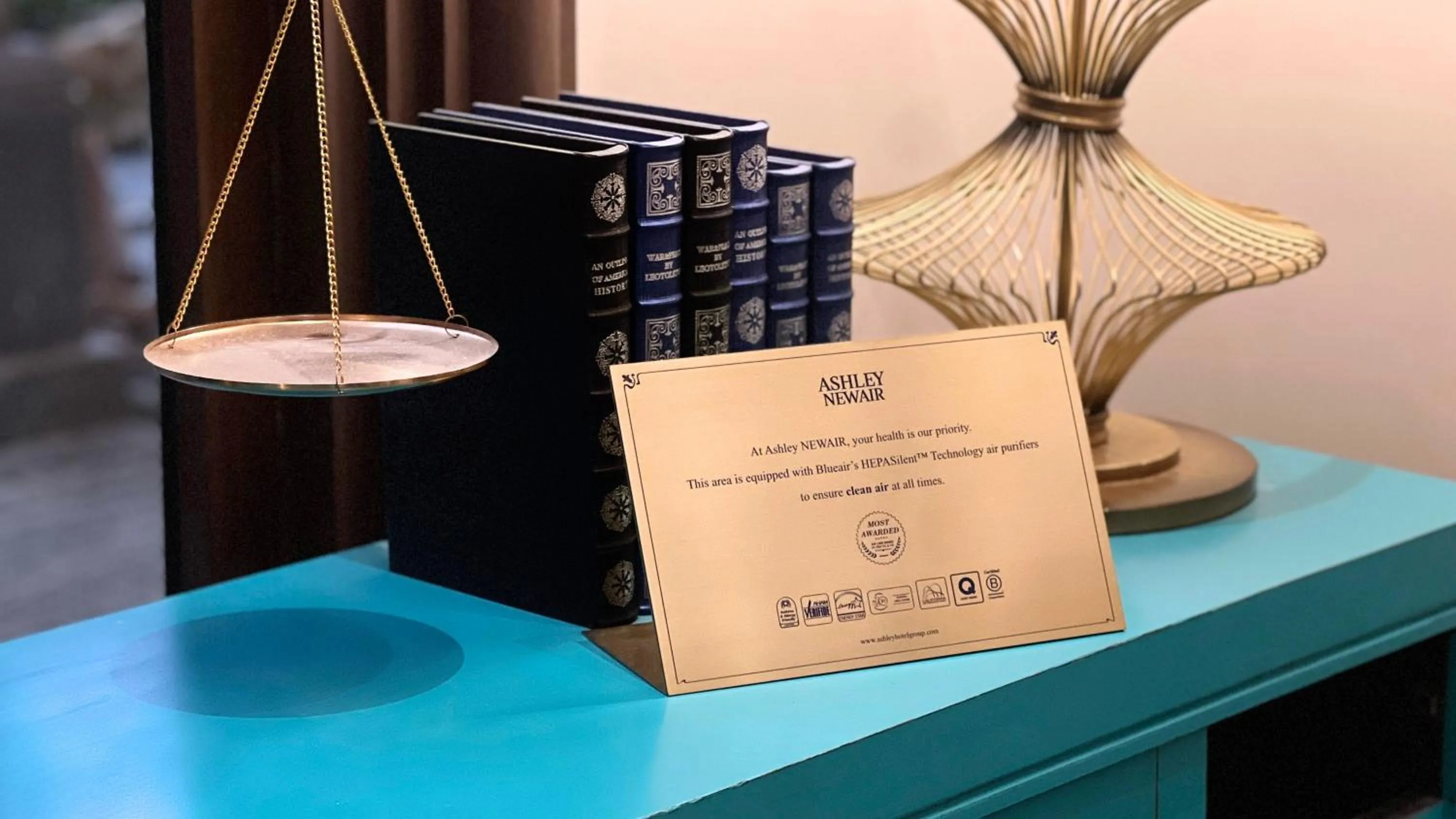 Logo/Certificate/Sign in ASHLEY NEWAIR Menteng with Air Purifier
