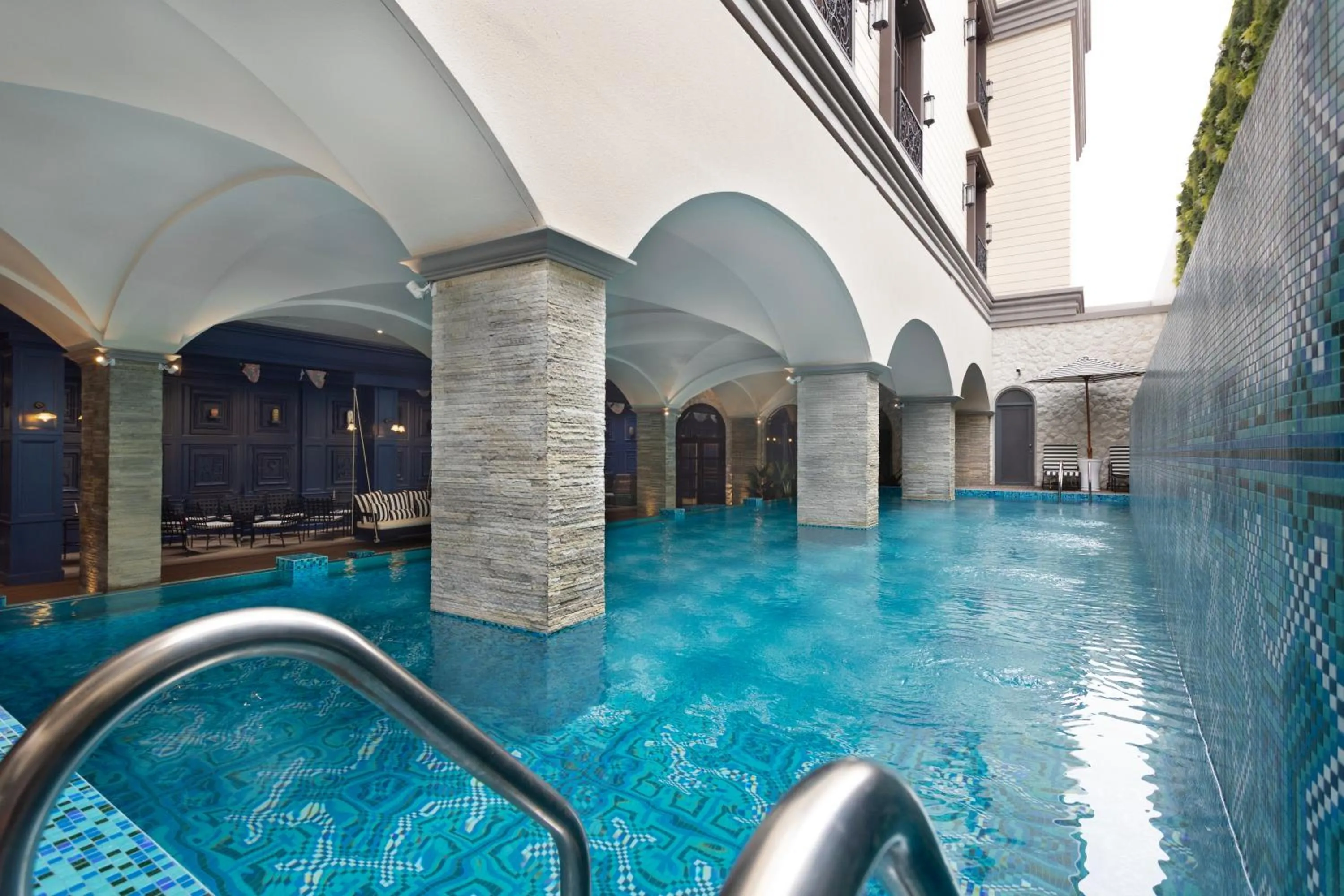 Swimming pool in ASHLEY NEWAIR Menteng with Air Purifier