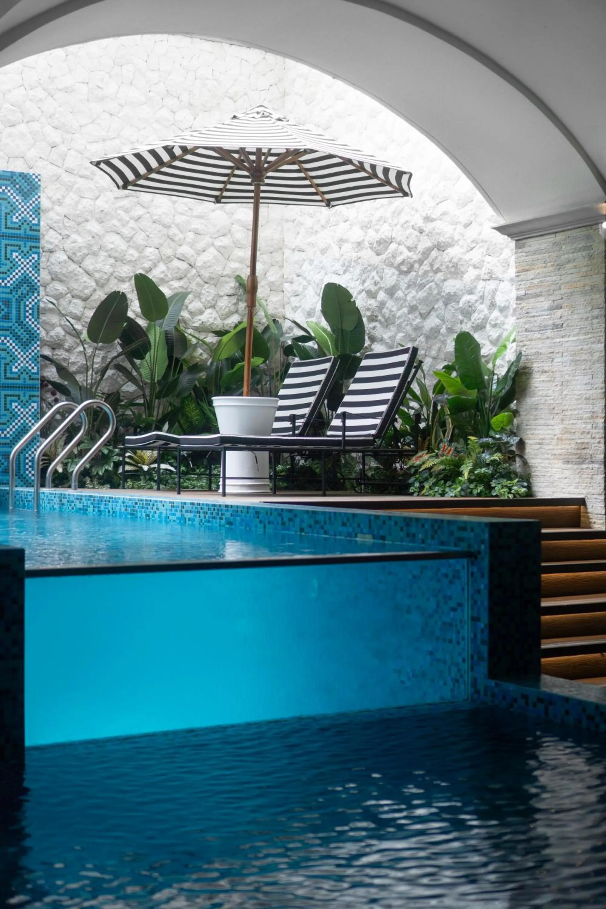 Swimming pool in ASHLEY NEWAIR Menteng with Air Purifier