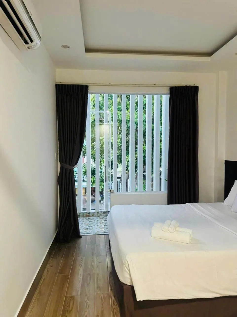 Bed in Full House Hotel Apartment
