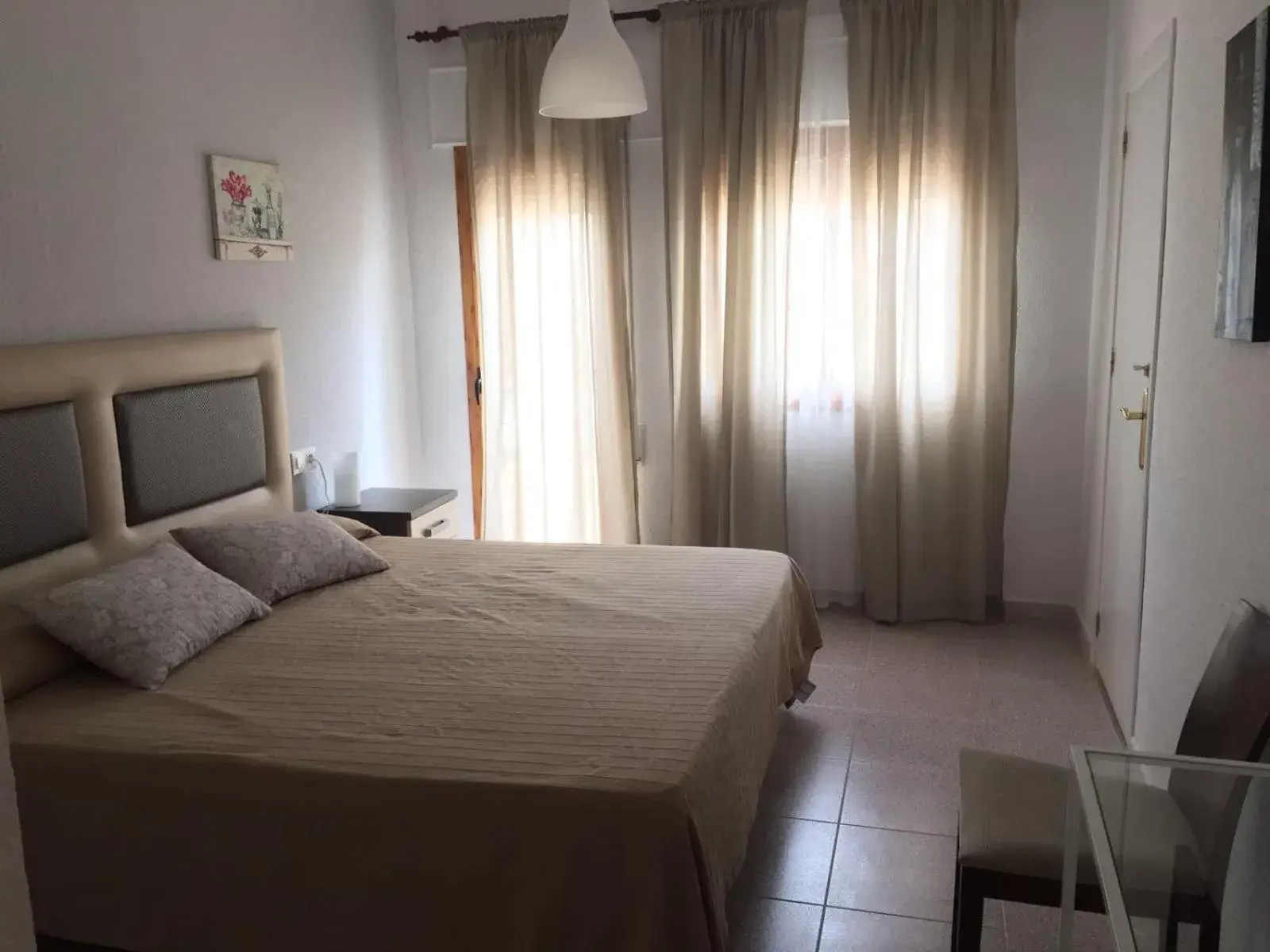 Family Room with Balcony in Hostal El Perejil Family Room with Balcony in Hostal El Perejil